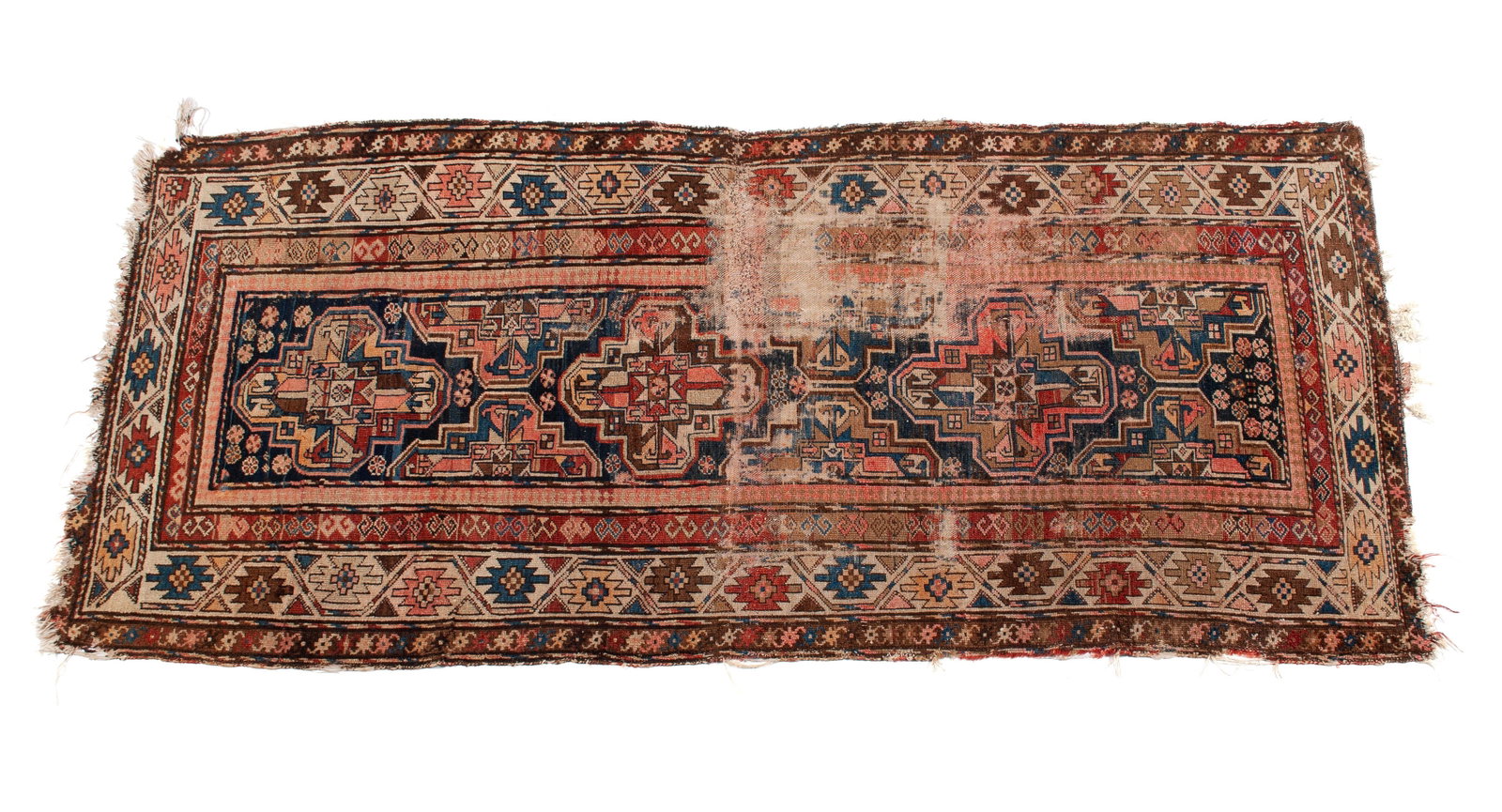 NORTHWEST PERSIAN LONG RUG: NORTHWEST PERSIAN LONG RUG Persian, early 20th century. Geometric medallions on the navy field, ivory border with abashed guard borders. The carpet has several very worn areas. 7 ft. 8 in. x 3 ft. 5 i