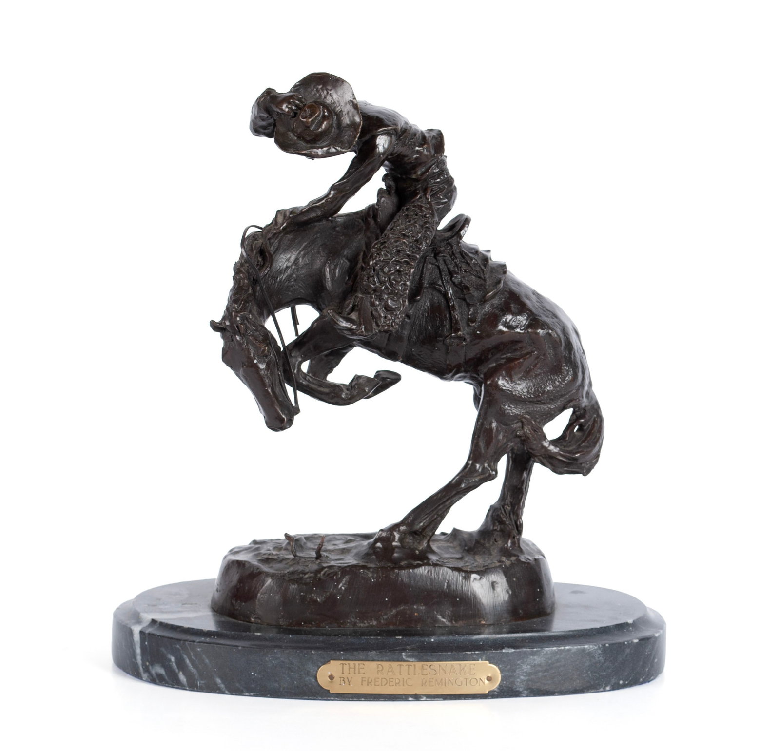 RATTLESNAKE AFTER FREDERIC REMINGTON: RATTLESNAKE AFTER FREDERIC REMINGTON Bronze, 20th century. One of Remington's most popular bronzes of a cowboy on back of a startled bronco. 11 1/2 x 11 x 7 in. (29.2 x 27.9 x 17.8 cm.)