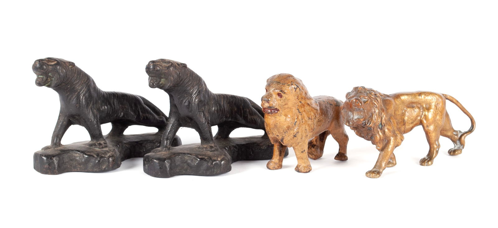 FOUR LION STATUETTES (1 of 9)