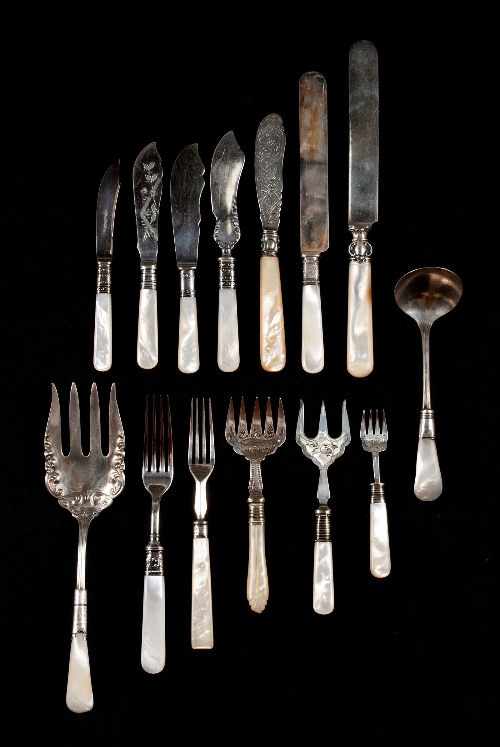 MOTHER-OF-PEARL HANDLED FLATWARE SERVICE (1 of 12)