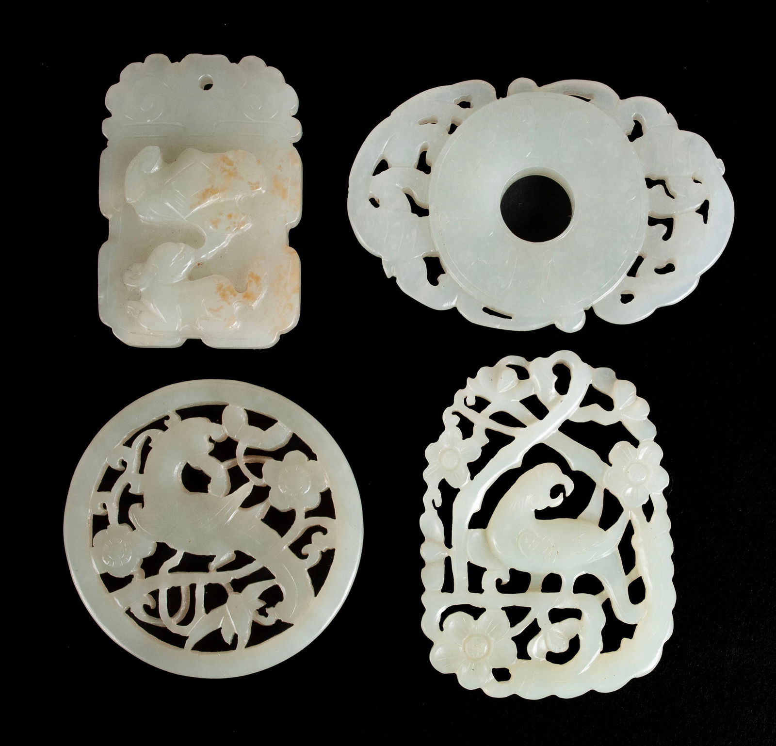 FOUR CARVED JADE MEDALLIONS (1 of 13)
