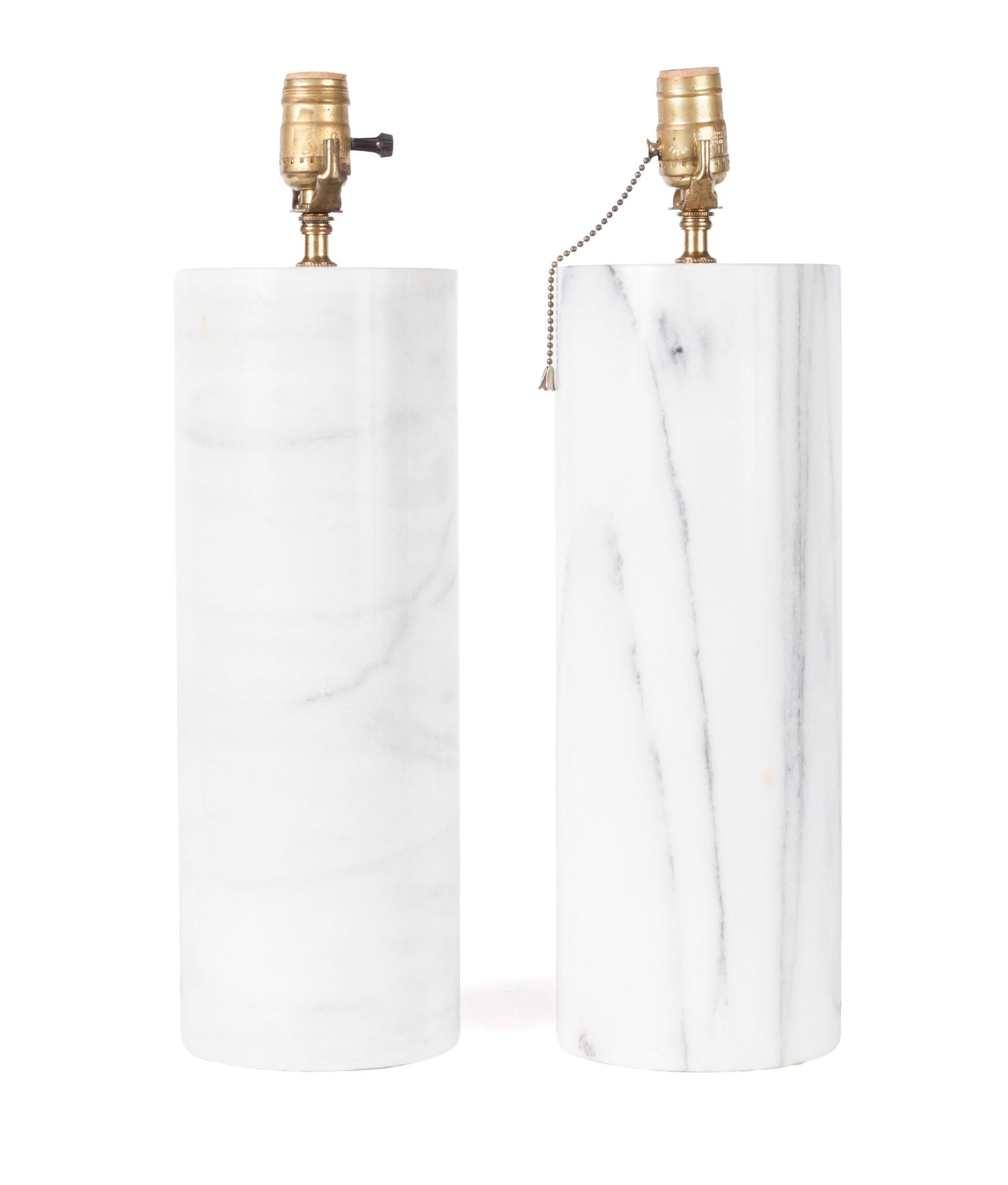 PAIR OF ROBERT SONNEMAN MARBLE TABLE LAMPS: PAIR OF ROBERT SONNEMAN MARBLE TABLE LAMPSAmerican, mid-20th century. A white cylindrical marble base issuing one light; no lamp shades included.18 1/2 in. (47 cm.)