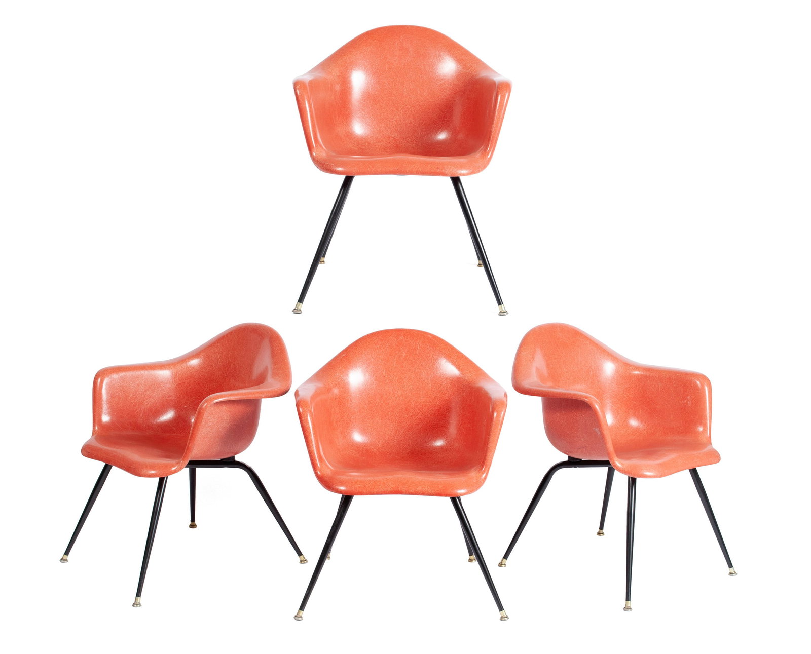 SET OF FOUR CHROMCRAFT FIBERGLASS ARMCHAIRS: SET OF FOUR CHROMCRAFT FIBERGLASS ARMCHAIRSAmerican, mid-20th century, signed in the mold to the bottom. Coral color on black metal legs.30 1/4 x 24 x 25 1/2 in. (76.8 x 61 x 64.8 cm.)
