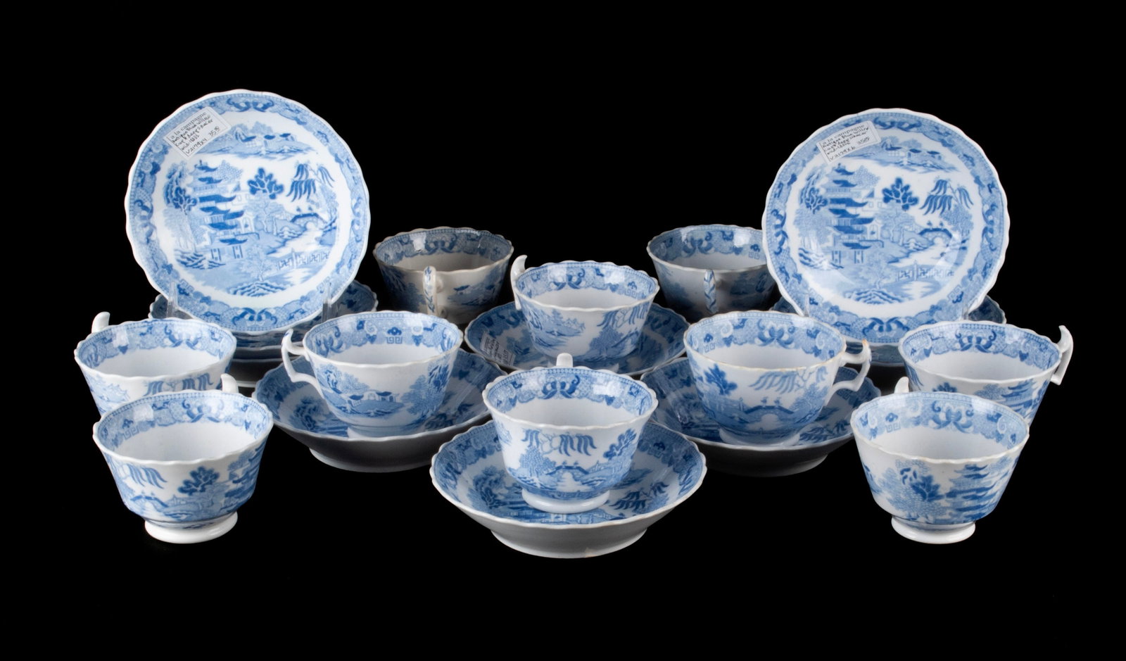 SET OF TEN MILES MASON PORCELAIN TEACUPS AND SAUCERS: SET OF TEN MILES MASON PORCELAIN TEACUPS AND SAUCERS England, Circa 1815. Minerva Works, Lane Delph, Willow transfer decoration, Pseudo Chinese Marks underfoot.