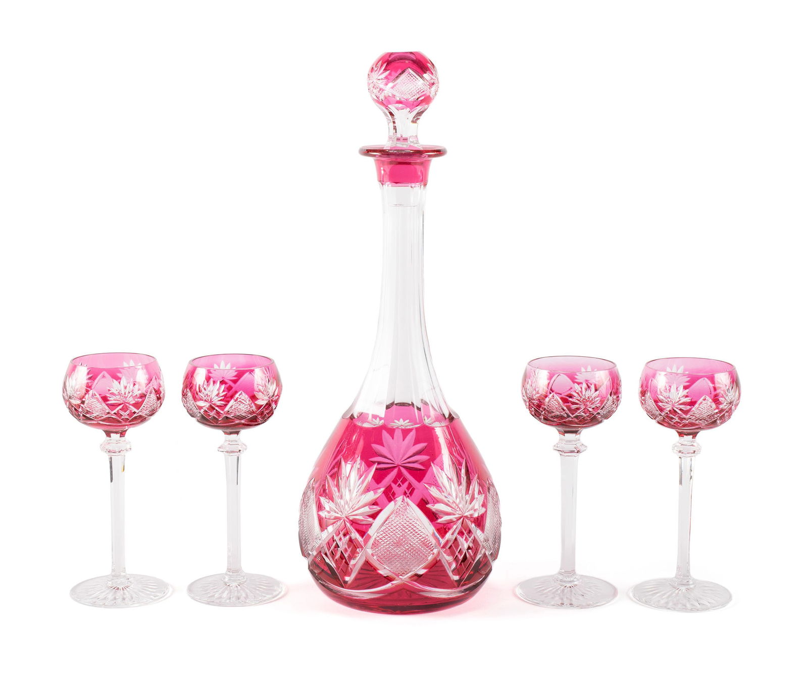 VAL SAINT LAMBERT BERNCASTEL DECANTER WITH FOUR CORDIAL GLASSES: VAL SAINT LAMBERT BERNCASTEL DECANTER WITH FOUR CORDIAL GLASSESBelgium, 20th century. Val Saint Lambert Berncastel cut to clear decanter with four (4) cordial glasses.Decanter: 13 1/2 in. (34.3 cm.),