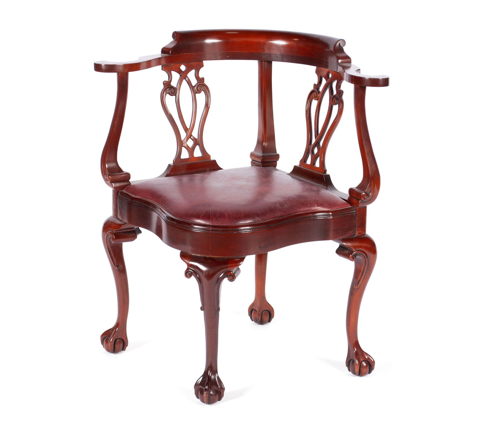 GEORGIAN STYLE MAHOGANY CORNER CHAIR BY SOUTHWOOD: GEORGIAN STYLE MAHOGANY CORNER CHAIR BY SOUTHWOOD20th century. Curved crest rail and scrolled arms supported by two pierced, urn form splats, over a shaped, burgundy leather seat, raised on cabriole l