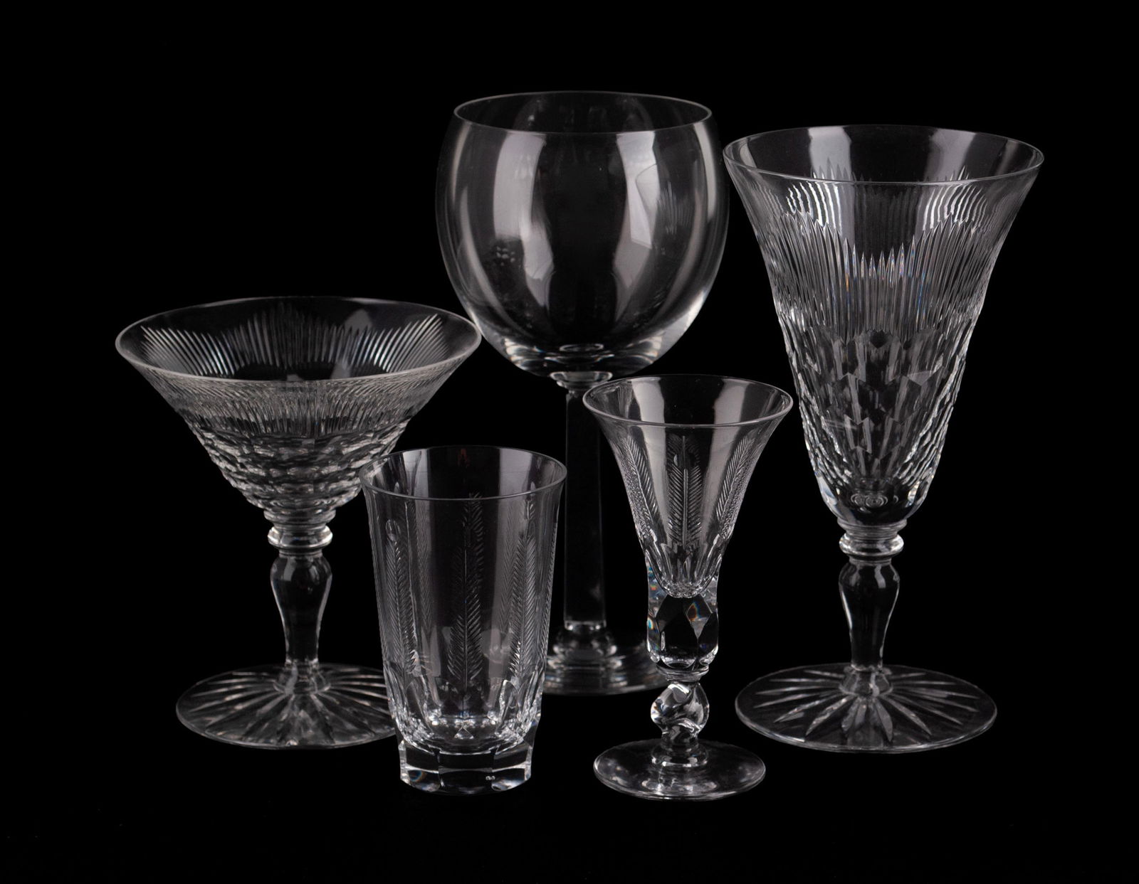 COLLECTION OF LIBBEY STEMWARE (27): COLLECTION OF LIBBEY STEMWARE (27)An assortment including wine glasses, champagnes, aperitifs and juice glasses, some with etched feather design.Largest: 7 in. (17.8 cm.)