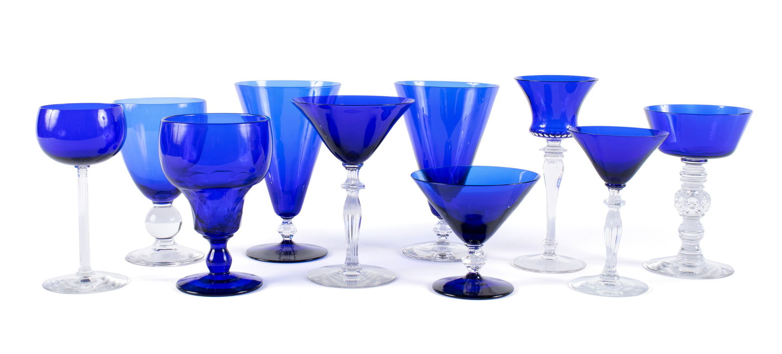 COLLECTION OF COBALT GLASS STEMWARE (42): COLLECTION OF COBALT GLASS STEMWARE (42)20th century. Forty-two (42) total including twelve (12) flared water goblets (6.5"), four (4) round water goblets (6"), three (3) coupes (3.875"