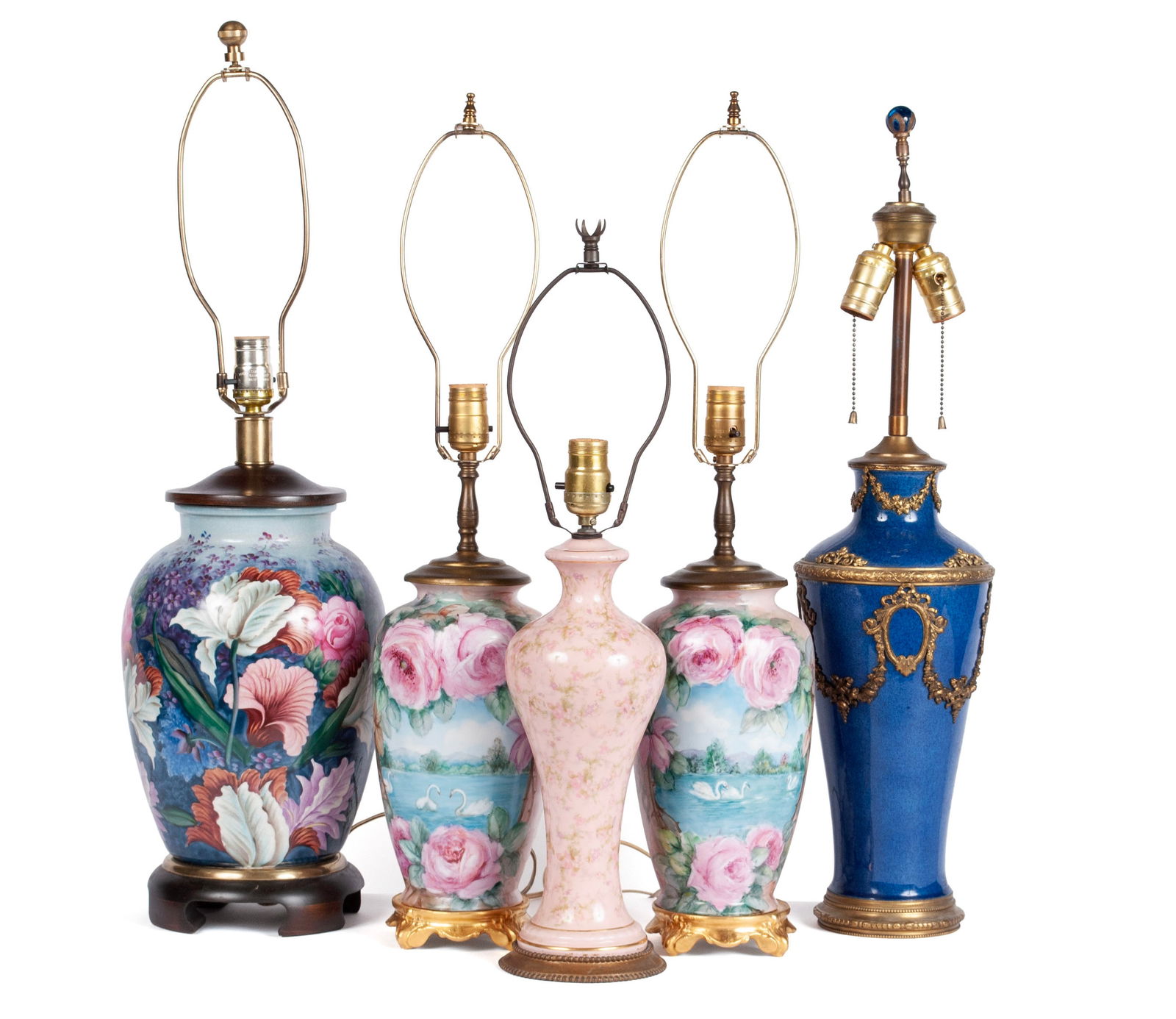 GROUP OF FIVE LAMPS: GROUP OF FIVE LAMPSAmerican, 20th century, porcelain. One (1) navy blue with gilt metal festoon mounts, the four (4) remaining, including a pair, all hand painted, likely by Frederick Cooper.Tallest: