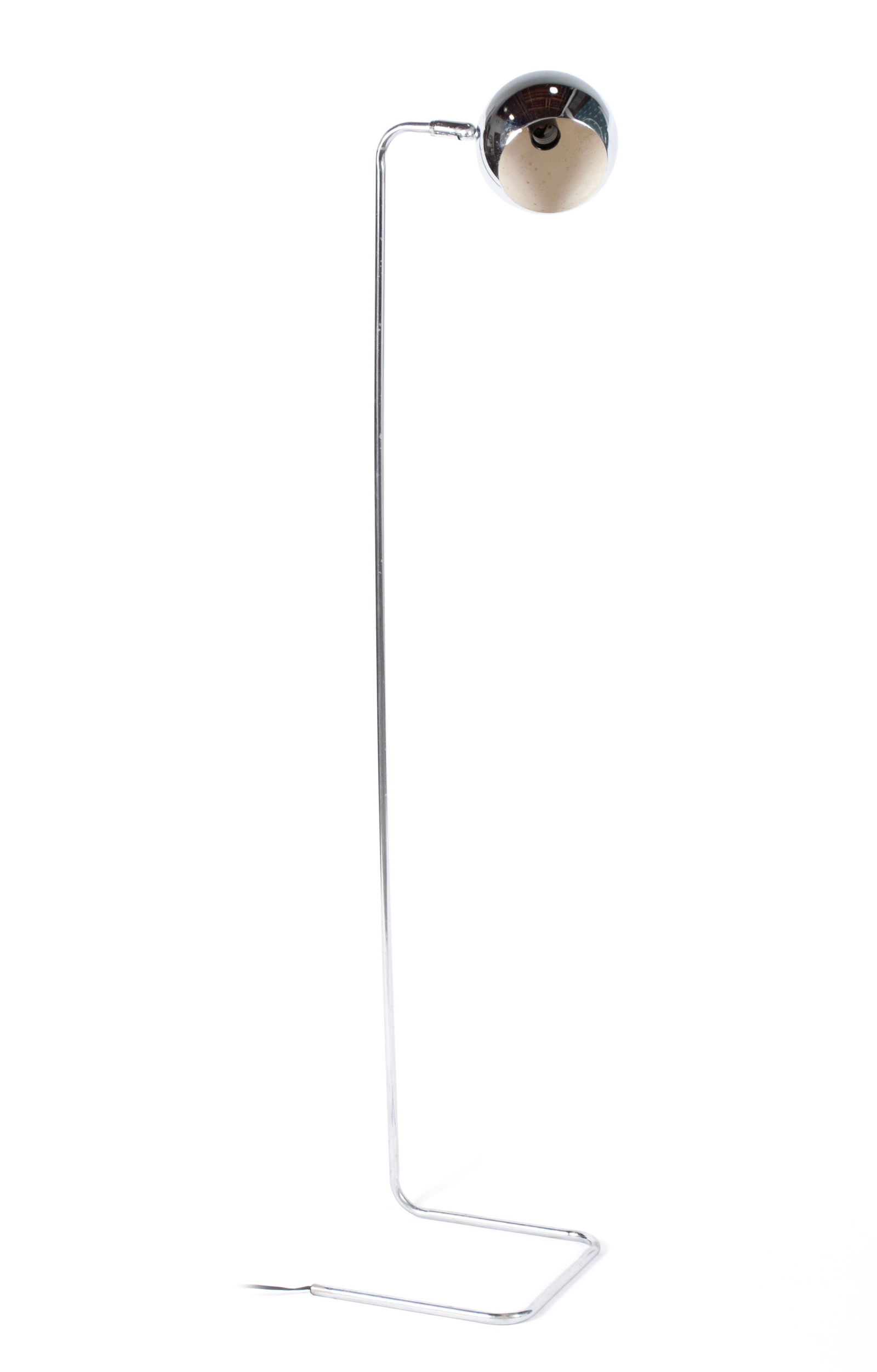 MCM CHROME EYEBALL FLOOR LAMP: MCM CHROME EYEBALL FLOOR LAMPAmerican, 20th century. Pivoting chrome eyeball light fixture on narrow chrome base, in the style of Robert Sonneman.51 x 10 1/2 in. (129.5 x 26.7 cm.)