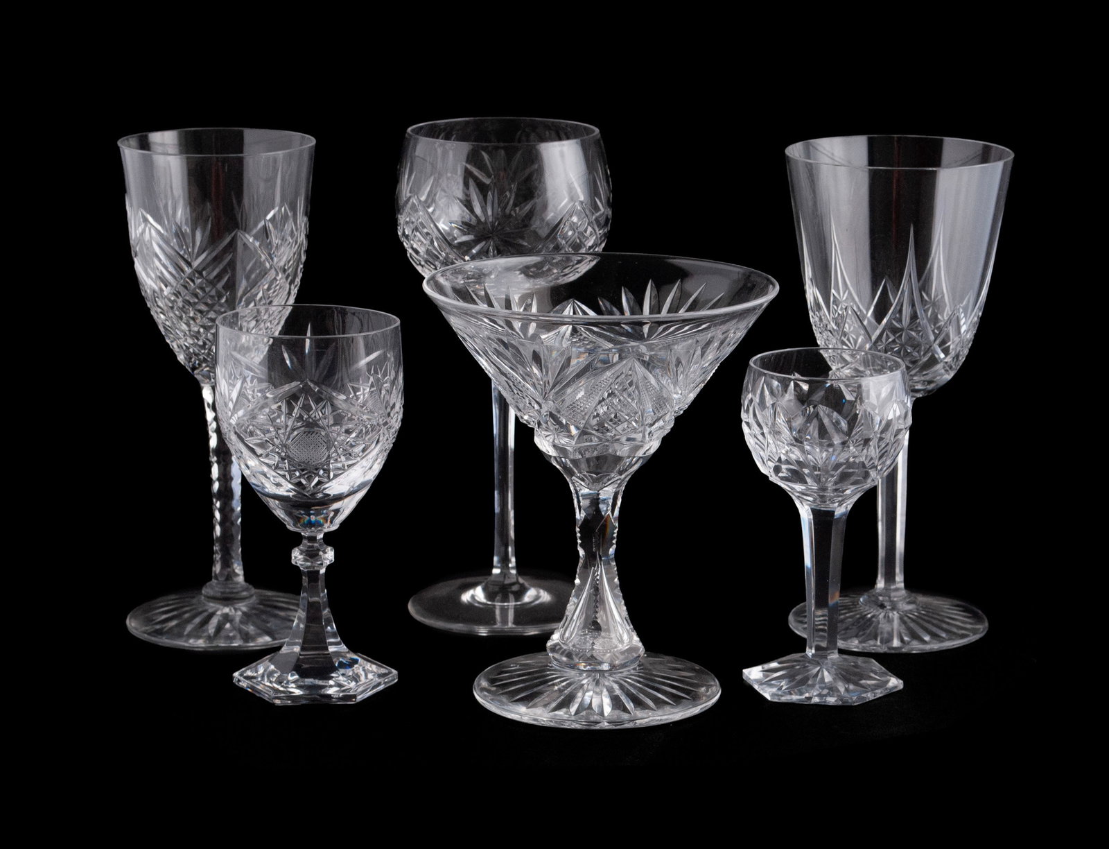 COLLECTION OF CUT GLASS STEMWARE (40): COLLECTION OF CUT GLASS STEMWARE (40) Forty (40) pieces total of assorted stemware including ten (10) round bowl wine stems, thirteen (13) tapering bowl wine stems, six (6) martini glasses, five (5) s