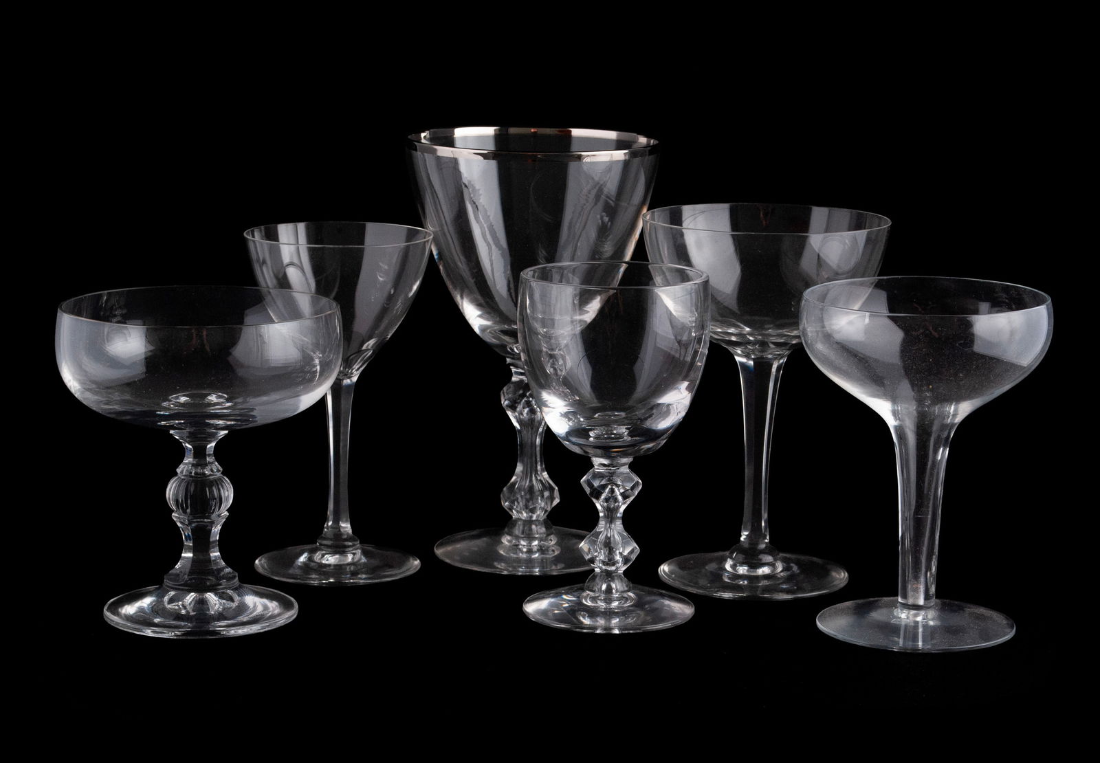COLLECTION OF CRYSTAL STEMWARE (40): COLLECTION OF CRYSTAL STEMWARE (40)Forty (40) pieces total of assorted stemware, including twelve (12) champagne coupes, five (5) champagne glasses and eight (8) wine glasses by Kosta Boda in the 'May