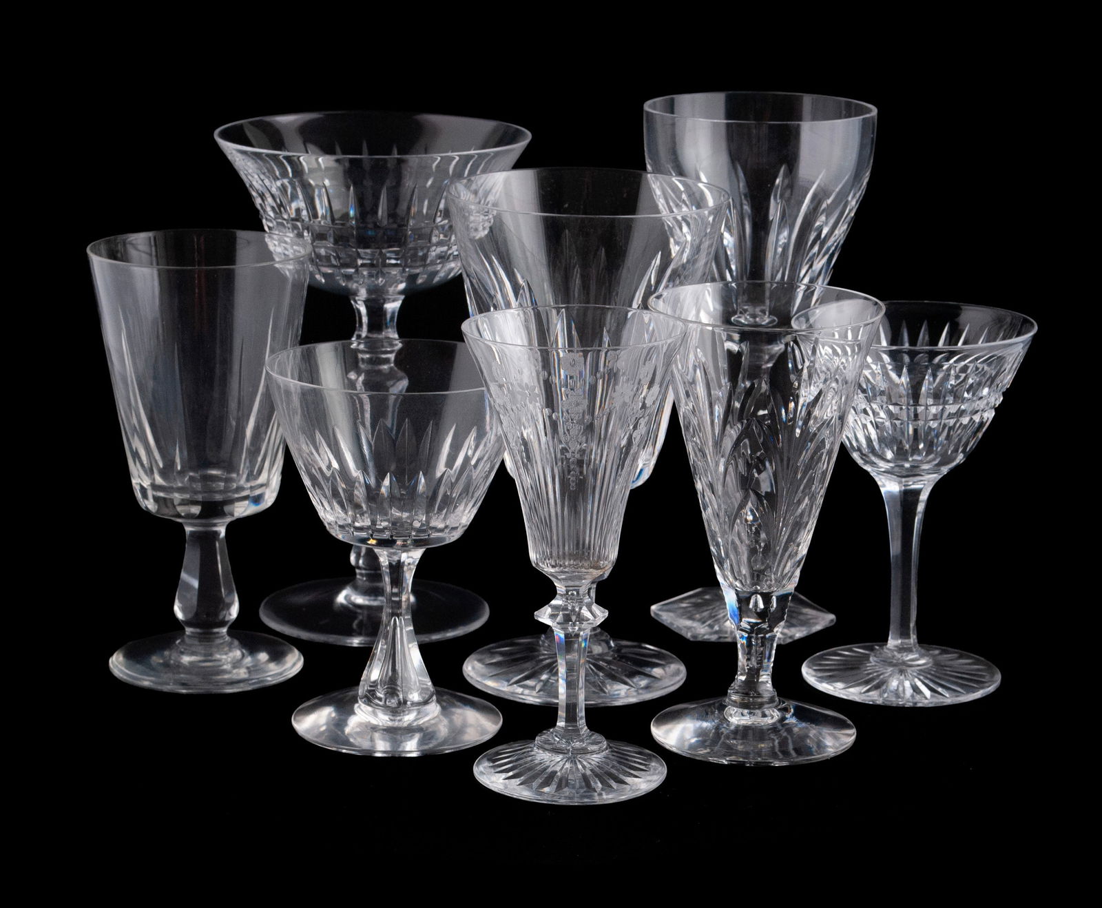 COLLECTION OF CUT GLASS STEMWARE (34): COLLECTION OF CUT GLASS STEMWARE (34)Thirty-four (34) pieces total of assorted stemware, including wine glasses, clarets, and cordials in varying patterns.Largest: 6 3/4 in. (17.1 cm.)