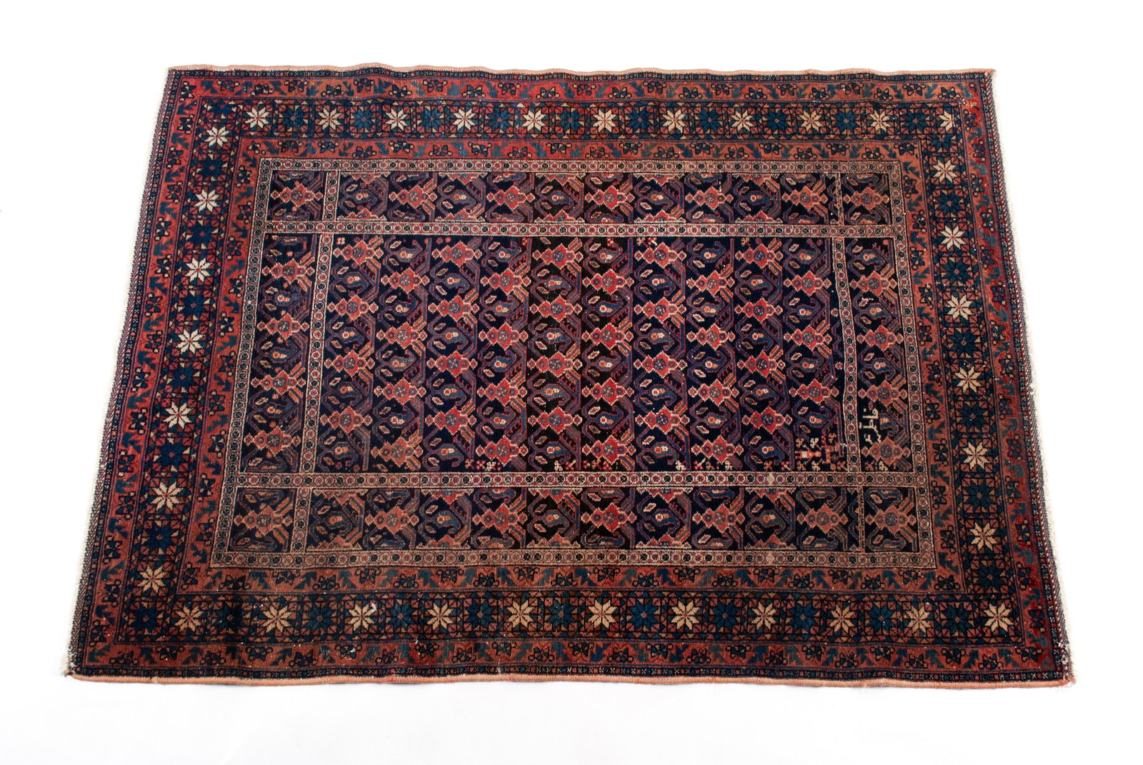 AFSHARI AREA RUG WITH SIGNATURE: AFSHARI AREA RUG WITH SIGNATURE Persian, 2nd quarter 20th century. Repetitive rows of blue and red medallions on the navy field, geometric border with guard borders. 5 ft. 3 in. x 3 ft. 9 in.