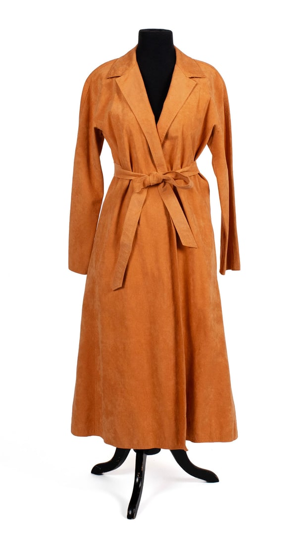 HALSTON ULTRASUEDE ENSEMBLE: HALSTON ULTRASUEDE ENSEMBLEAmerican, circa 1970s, ultrasuede. Full-length wrap dress and matching wrap skirt. No label in skirt.Dress length: 47 in. (119.4 cm.) Provenance: From the private collection