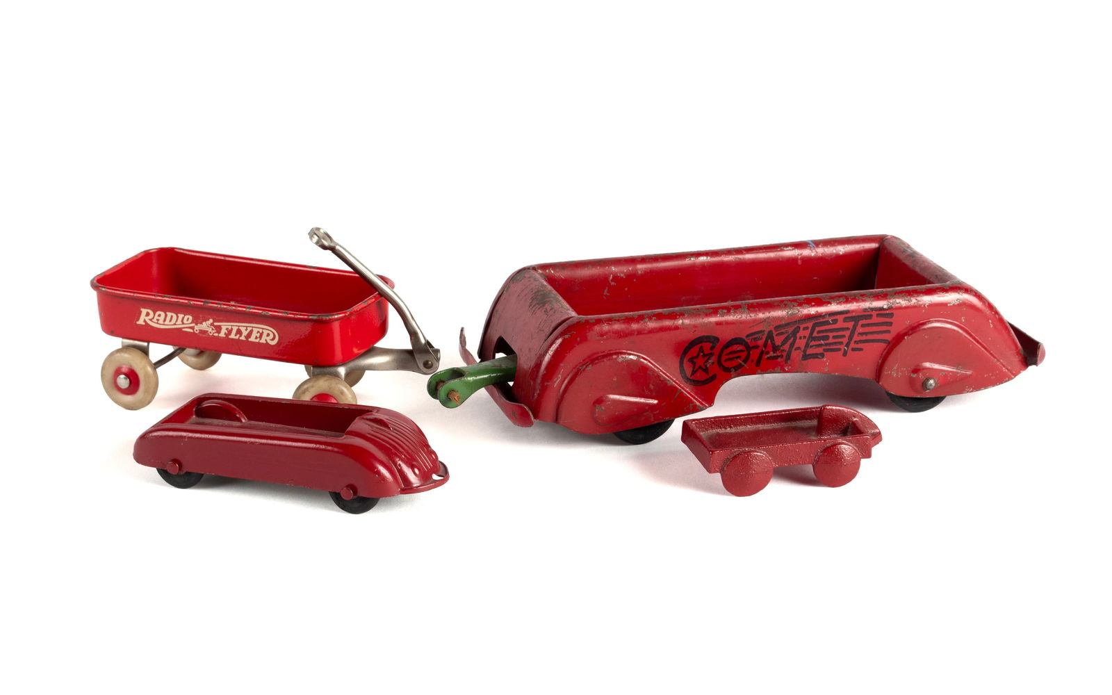 FOUR DIMINUTIVE METAL TOY WAGONS (1 of 9)