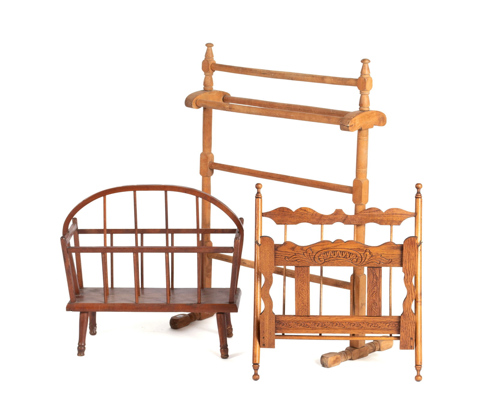 TWO MAGAZINE RACKS AND A QUILT RACK: TWO MAGAZINE RACKS AND A QUILT RACK19th/20th century. Three (3) pieces, including a Windsor-style magazine rack, a folding Eastlake-style magazine rack and a quilt rack.Largest: 32 x 10 x 22 1/2 in. (