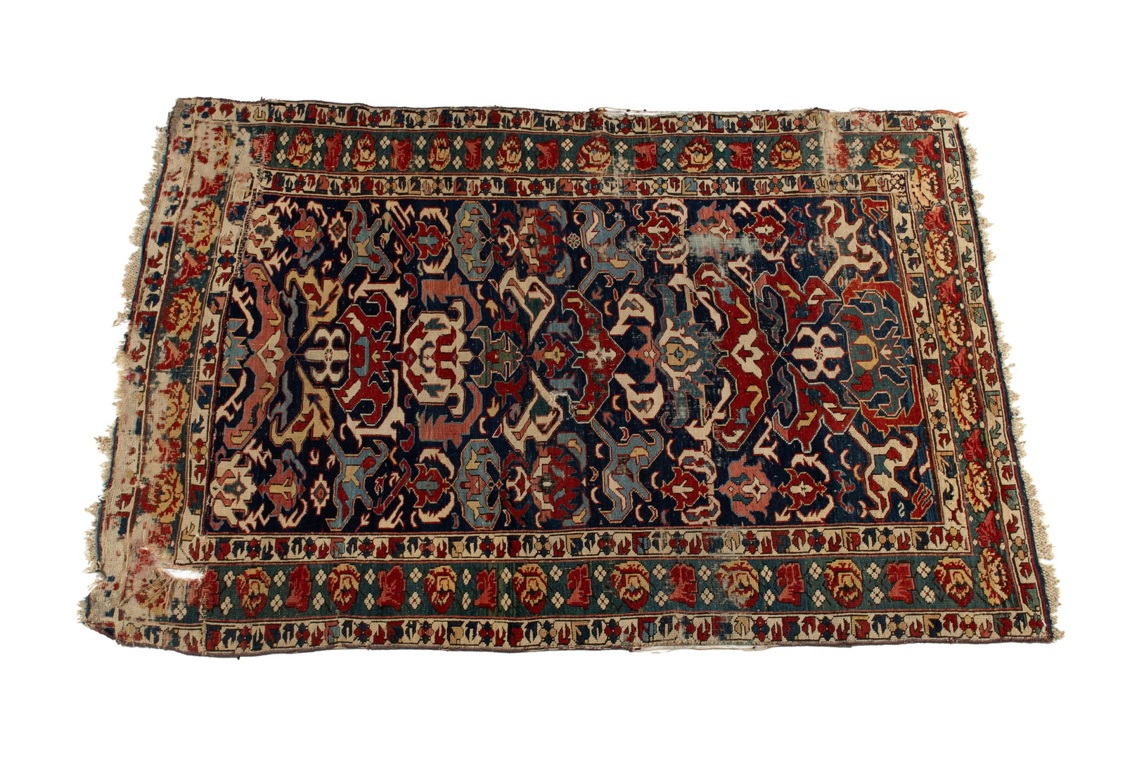 KAZAK AREA RUG: KAZAK AREA RUG Persian, circa 1880. Blue, red and white shapes cover the navy field, blue border with ivory guard borders, shows much wear. 6 ft. 1 in. x 4 ft. 1 in.