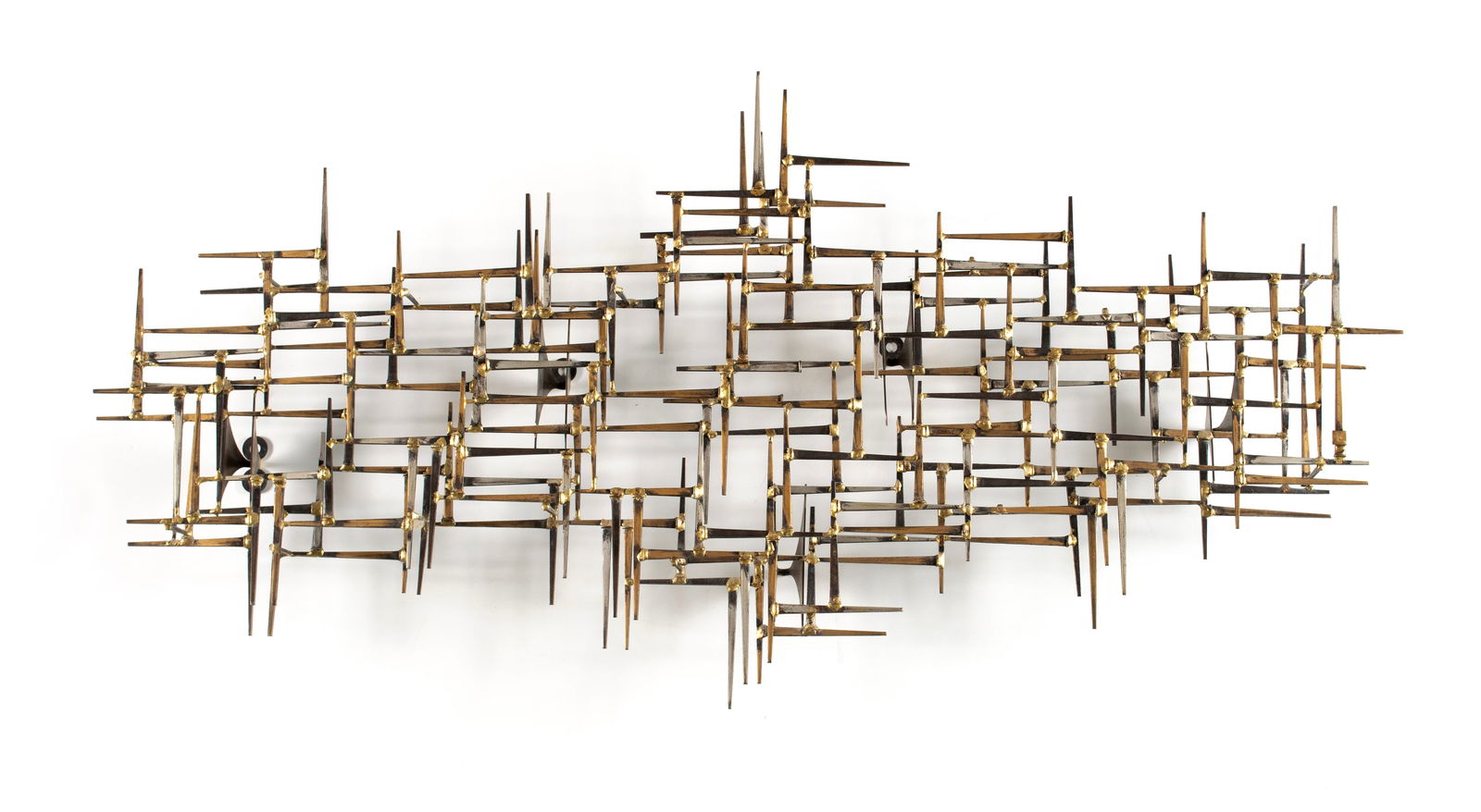 MARC WEINSTEIN (MARC CREATES) BRUTALIST METAL WALL SCULPTURE: MARC WEINSTEIN (MARC CREATES) BRUTALIST METAL WALL SCULPTURECirca 1970s, labeled on hanging bracket. Wall sculpture made up of nail forms.20 1/2 x 43 x 4 3/4 in. (52.1 x 109.2 x 12.1 cm.)