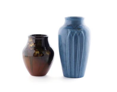 TWO ROOKWOOD POTTERY VASES: TWO ROOKWOOD POTTERY VASESAmerican, early 20th century. A Carrie Steinle floral painted standard glaze vase, shape #914F, dated 1903. Together with a blue mat glaze production vase shape #1823, dated