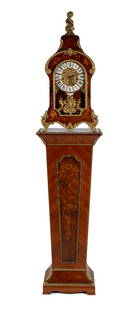 MARQUETRY BRACKET CLOCK ON PEDESTAL: MARQUETRY BRACKET CLOCK ON PEDESTALItalian, 20th century. Cartouche form clock case with allover Louis XV style gilt metal mounts, holds the Franz Hermle, German movement behind the brass dial with en