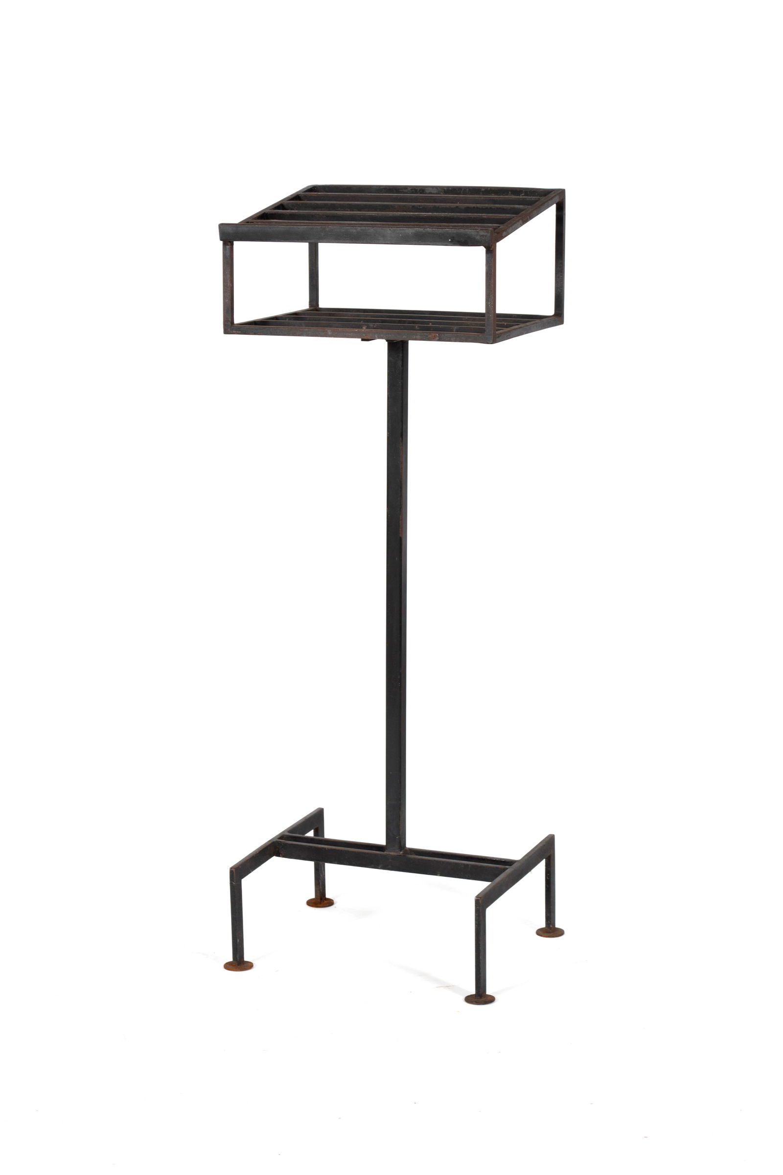 BROTHER MEL MEYER (AMERICAN (ST. LOUIS), 1928-2013): Brother Mel MeyerAmerican (St. Louis), 1928-2013SteelLectern with open grate shelves, on four foot base.Brother Mel Meyer was born in Florissant, MO in 1928 and joined the Marianist order of monks at