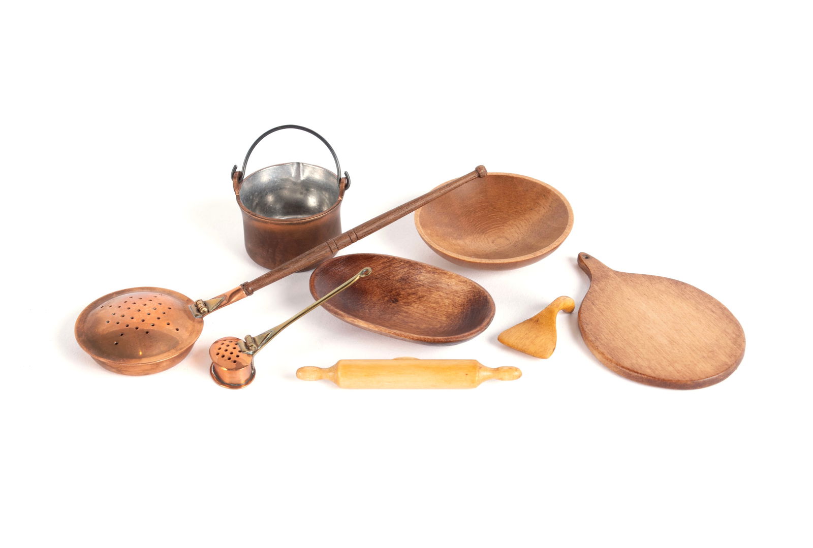 COLLECTION OF MINIATURE KITCHENWARE: COLLECTION OF MINIATURE KITCHENWAREEight (8) pieces. Including two (2) wooden bowls by Tom Thumb, a wooden pie board by Tom Thumb, rolling pin and spatula. Together with three copper pieces, unmarked,