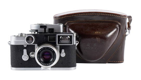 LEICA M3 ERNST LEITZ WETZLAR CAMERA: LEICA M3 ERNST LEITZ WETZLAR CAMERAS# 806935. Leitz Wetzlar Summicron lens 1:2/35, in fitted leather case.Case: 5 x 7 in. (12.7 x 17.8 cm.)