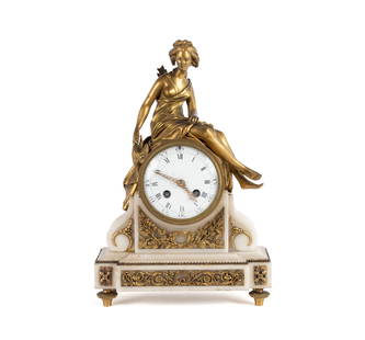 SAMUEL MARTI FOR TIFFANY & CO. LOUIS XVI STYLE FIGURAL CLOCK: SAMUEL MARTI FOR TIFFANY & CO. LOUIS XVI STYLE FIGURAL CLOCKFrance, circa 1900, gilt bronze and marble. Mantel clock with female archer, bow in one hand and game in the other, seated above the clock f