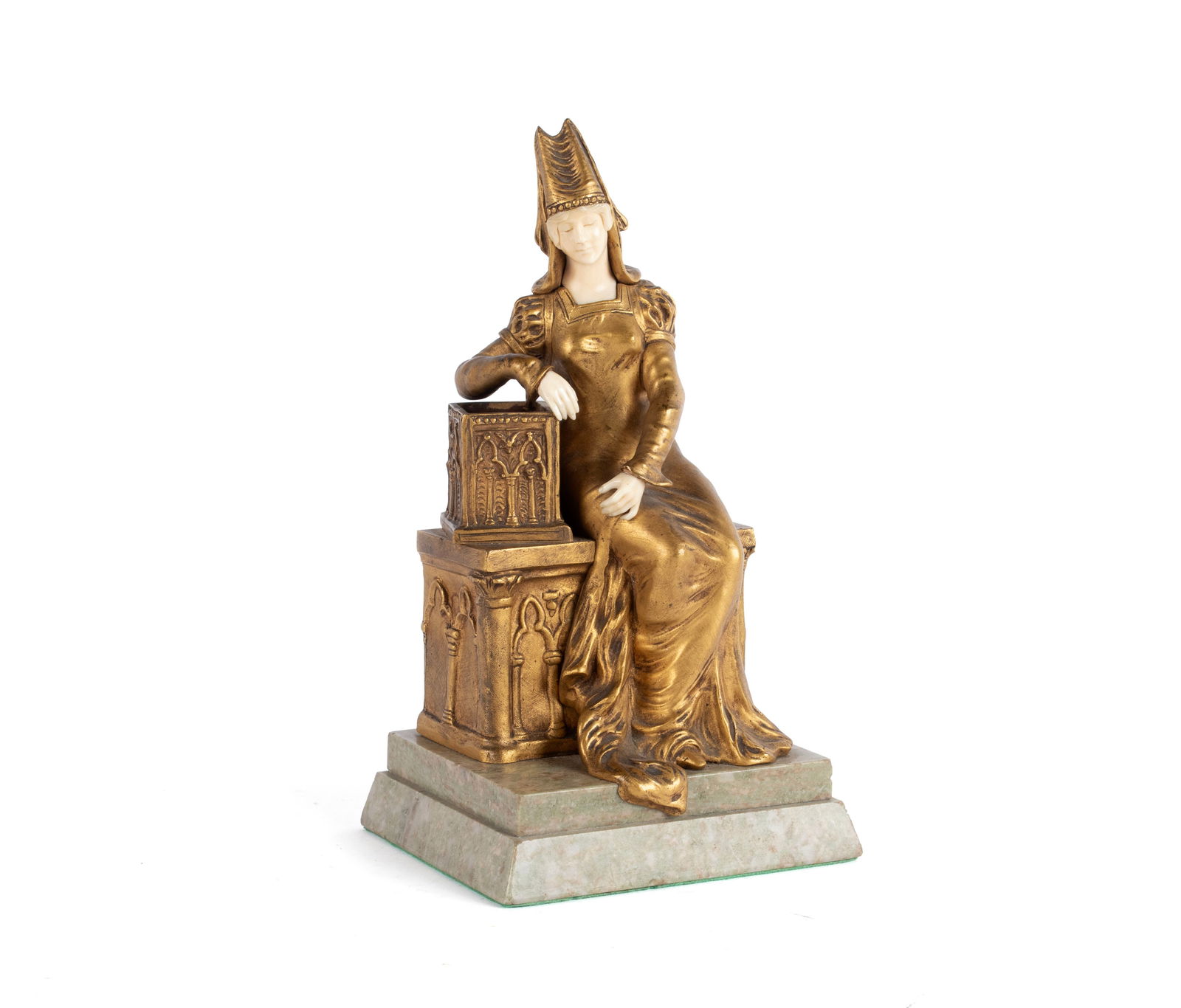 AFTER XAVIER RAPHANEL (FRENCH, 1876-1957) BRONZE: AFTER XAVIER RAPHANEL (FRENCH, 1876-1957) BRONZELate 19th/early 20th century, gilt bronze and ivory. A French noblewoman seated on a gothic coffer, affixed to a marble base. Unsigned.11 1/2 x 5 x 6 1/