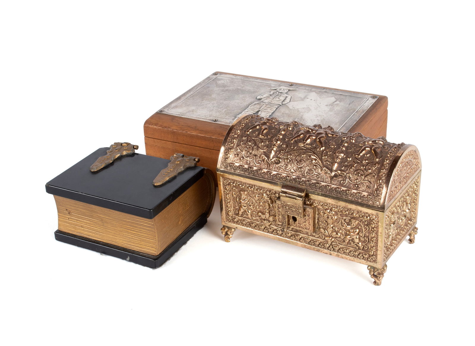 THREE DECORATIVE BOXES: THREE DECORATIVE BOXES20th century. Including a 'Pinkerton' cigar box with sterling plaque by Gorham, marked on the lower right edge, a Baroque style casket box, and a wooden and slate book form box.L