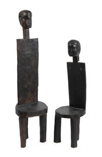 PAIR OF AFRICAN FIGURAL CHAIRS: PAIR OF AFRICAN FIGURAL CHAIRSLikely Tanzanian. Two (2) figural chairs, male and female, with lizard carving to backs, on tripod bases.Larger: 49 x 12 in. (124.5 x 30.5 cm.)