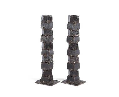 PAIR OF BRUTALIST STEEL CANDLESTICKS: PAIR OF BRUTALIST STEEL CANDLESTICKSUnsigned. Stacked offset welded nuts with square platforms.11 3/4 in. (29.8 cm.)