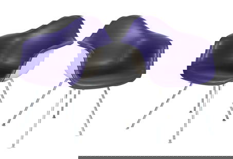 CHARLES EAMES FOR HERMAN MILLER PAIR OF SHELL ARMCHAIRS: CHARLES EAMES FOR HERMAN MILLER PAIR OF SHELL ARMCHAIRS1965-1978, purple vinyl covering to the off-white fiberglass shells. Bears the Herman Miller paper labels under late Cincinnati Milacron (star) s