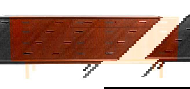 BORGE MOGENSEN FOR FREDERICIA DRESSER ON STAND: BORGE MOGENSEN FOR FREDERICIA DRESSER ON STANDDanish, circa 1962, teak. Solid rectangular form with two columns of four drawers each, ink stamped "Made in Denmark" to the back.30 x 17 3/4 x 78 in. (76