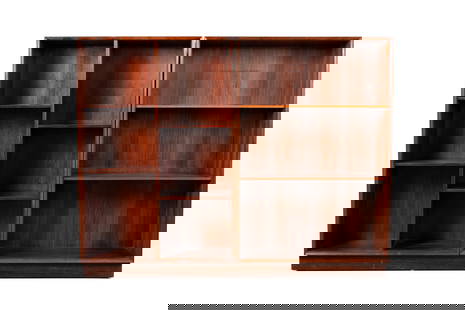 ARNE VODDER FOR SIBAST MOBLER BOOKCASE: ARNE VODDER FOR SIBAST MOBLER BOOKCASEDanish, circa 1967, rosewood. Two members connected on a single base, the left cabinet having a central divide with shelves, the right side with full width shelve