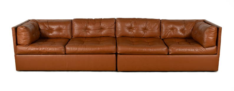 TWO-PIECE BROWN SOFA SET BY PREVIEW FURNITURE: TWO-PIECE BROWN SOFA SET BY PREVIEW FURNITUREAmerican, 1980s. Two (2) opposing forms together creating one (1) long sofa, with two back cushions and two 90-degree corner cushions.27 x 30 x 117 in. (68