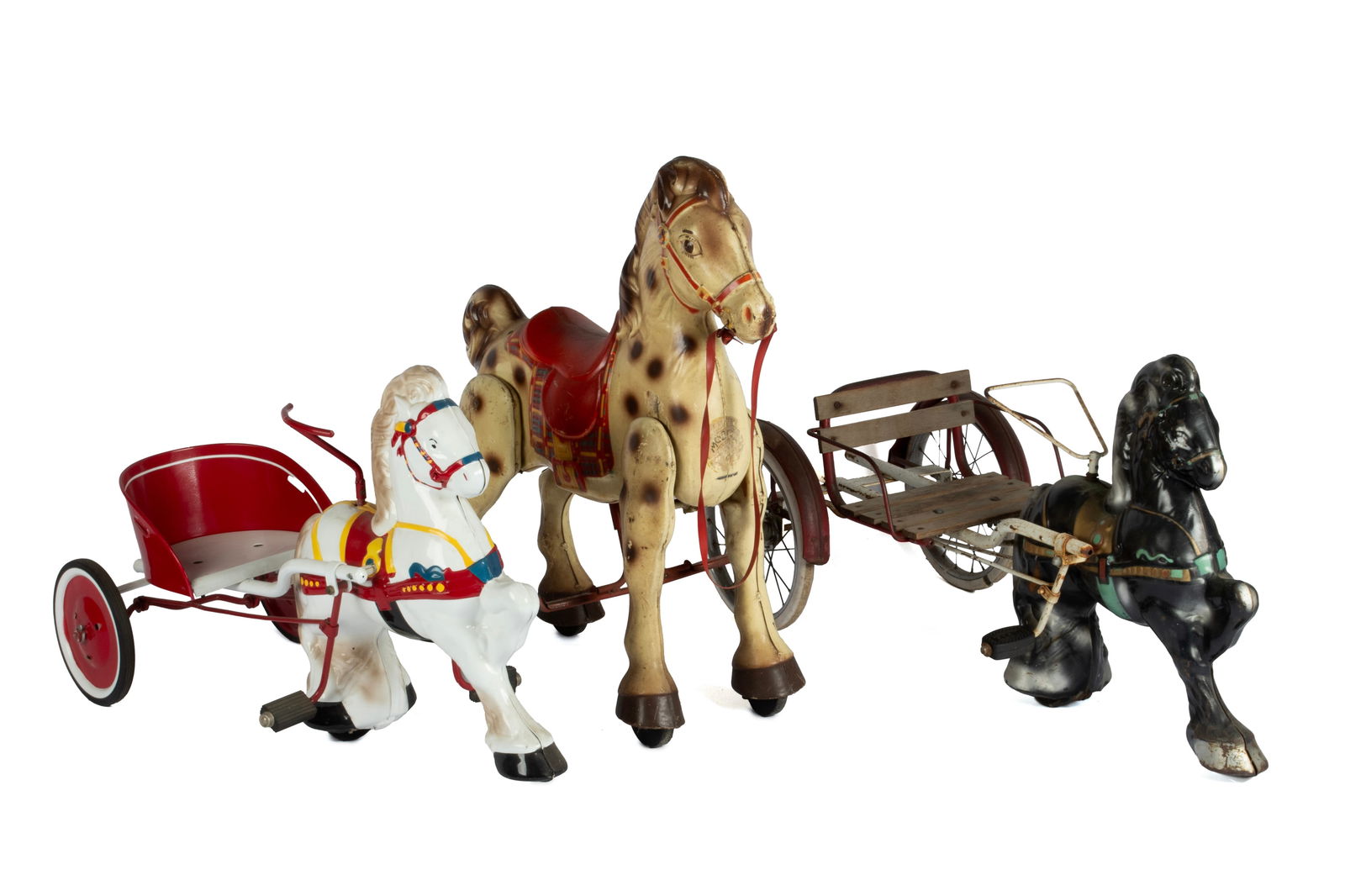 THREE MOBO RIDING TOYS: THREE MOBO RIDING TOYSTwo (2) smaller horsedrawn toys, one (1) with a white horse, the other black. Together with a stand-alone Mobo horse.Tallest: 31 x 26 x 13 1/2 in. (78.7 x 66 x 34.3 cm.)