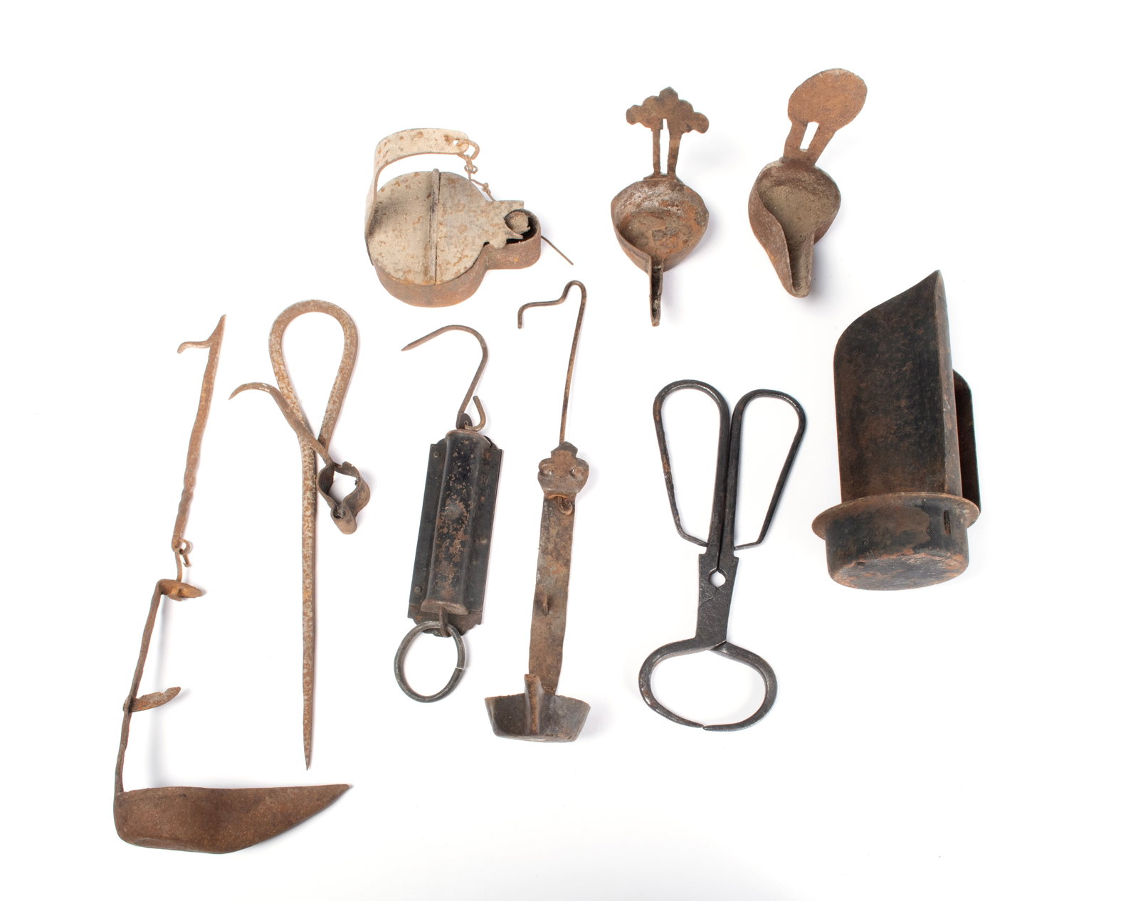 COLLECTION OF ANTIQUE METAL WORK: COLLECTION OF ANTIQUE METAL WORK Nine (9) pieces including whale oil lamps, spike hangers, scale, and more. Largest: 7 1/2 x 3 in. (19.1 x 7.6 cm.)