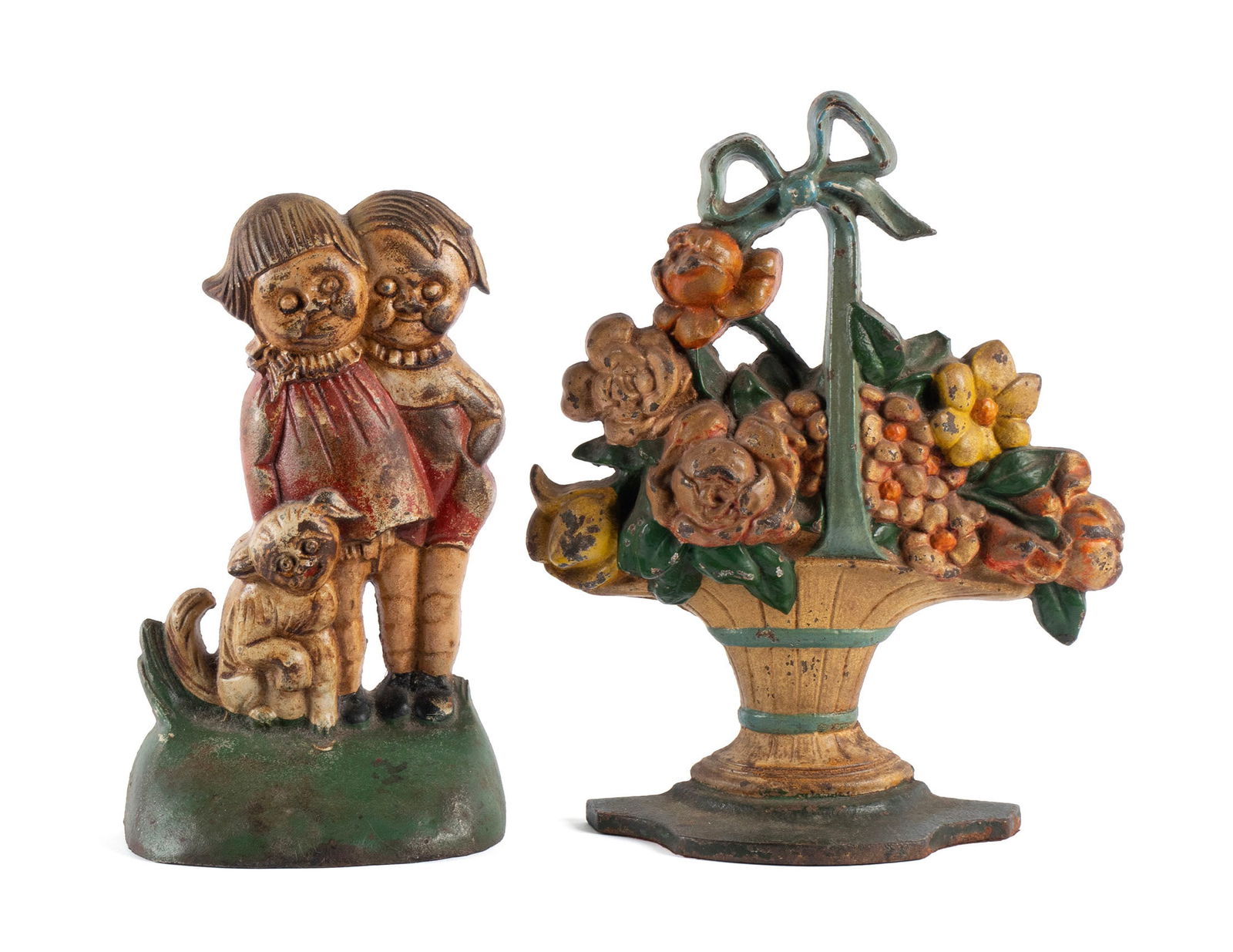 TWO PAINTED CAST IRON DOORSTOPS: TWO PAINTED CAST IRON DOORSTOPS20th century. Including a Hubley 'Campbell Soup Kids' doorstop and a basket of flowers doorstop.Largest: 11 x 9 in. (27.9 x 22.9 cm.)