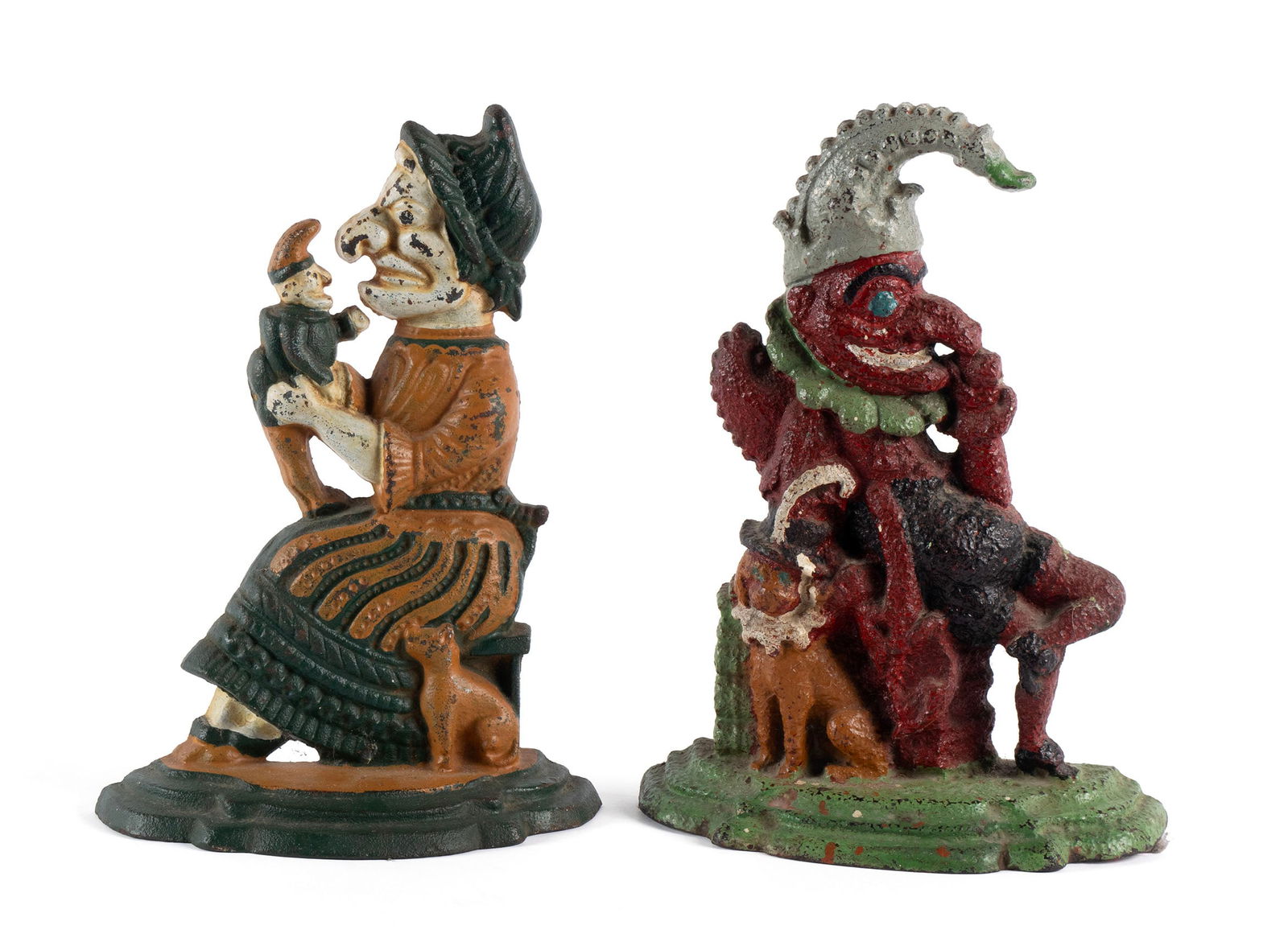 PUNCH AND JUDY DOORSTOPS: PUNCH AND JUDY DOORSTOPSAmerican, early 20th century, cast iron. Pair of figural cast iron doorstops.12 1/2 x 9 in. (31.8 x 22.9 cm.)