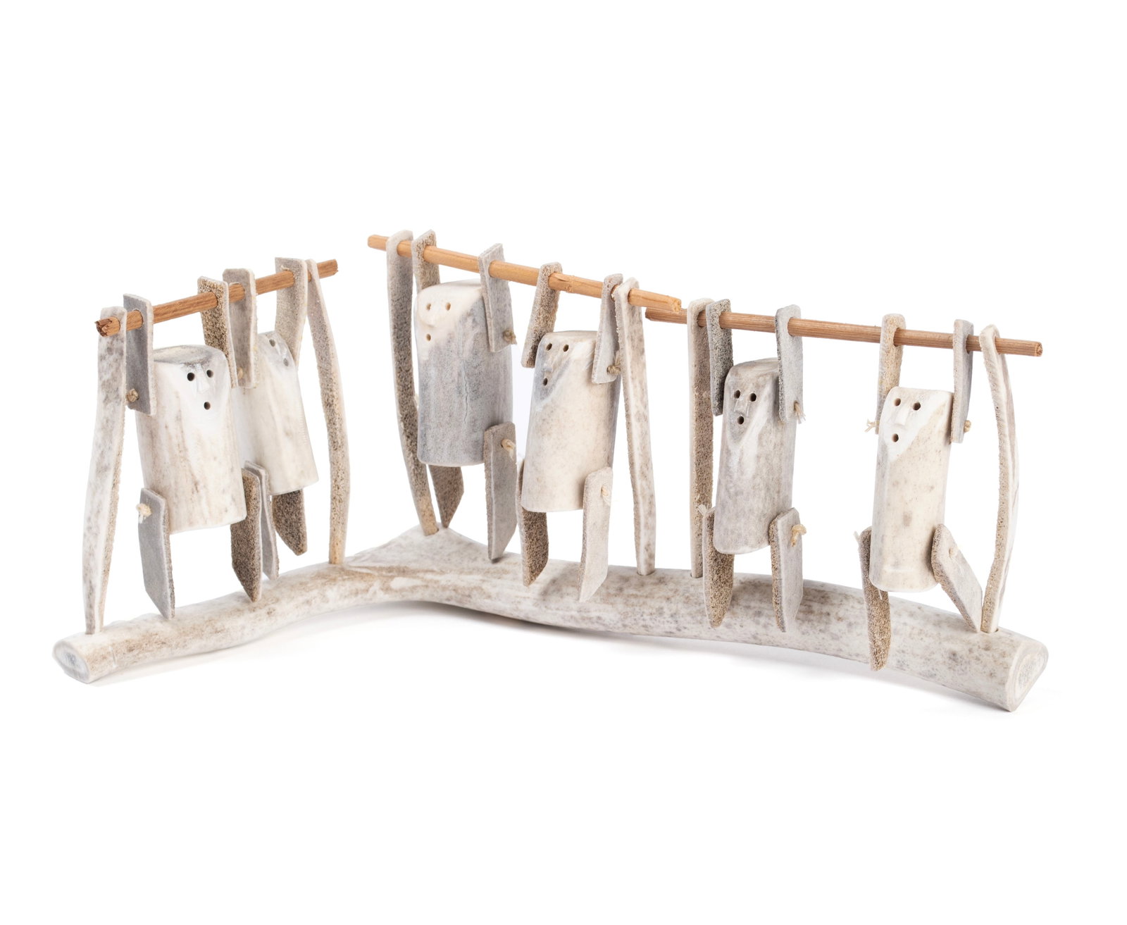 LUKE ANOWTALIK (ARVIAT, 1932-2006): Luke Anowtalik Arviat, 1932-2006 Acrobats Antler, wood Six acrobats on base. unsigned. 5 1/4 x 13 x 6 in. (13.3 x 33 x 15.2 cm.)