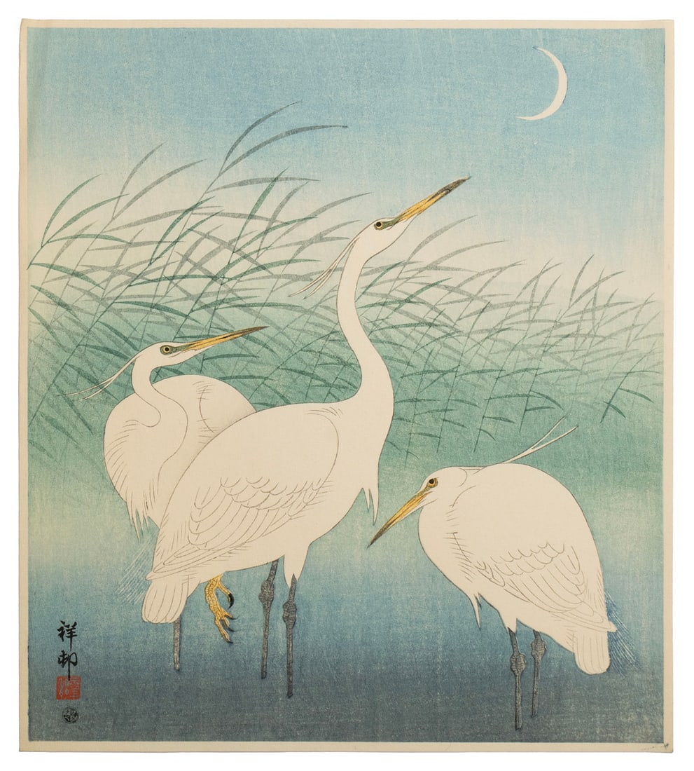 OHARA KOSON (SHOSON) (JAPANESE, 1877-1945): Ohara Koson (Shoson)Japanese, 1877-1945Herons in Shallow WaterWoodblockCirca 1930's, signed and sealed Shoson. Three herons standing in shallow water in view of reeds and crescent moon, unframed.11 x