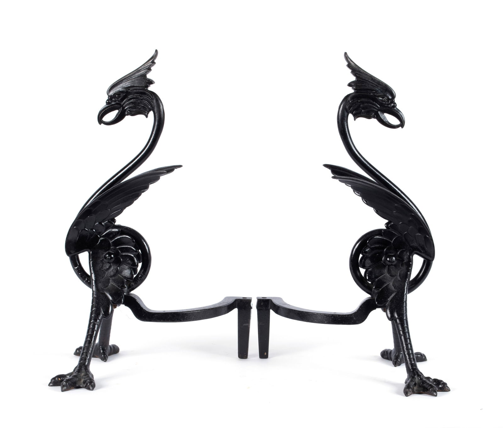 BRADLEY & HUBBARD GRIFFIN ANDIRONS: BRADLEY & HUBBARD GRIFFIN ANDIRONSAmerican, early 20th century, iron. Exaggerated scrolling form with wings and bird feet, now painted black.20 1/4 x 12 x 11 1/2 in. (51.4 x 30.5 x 29.2 cm.)