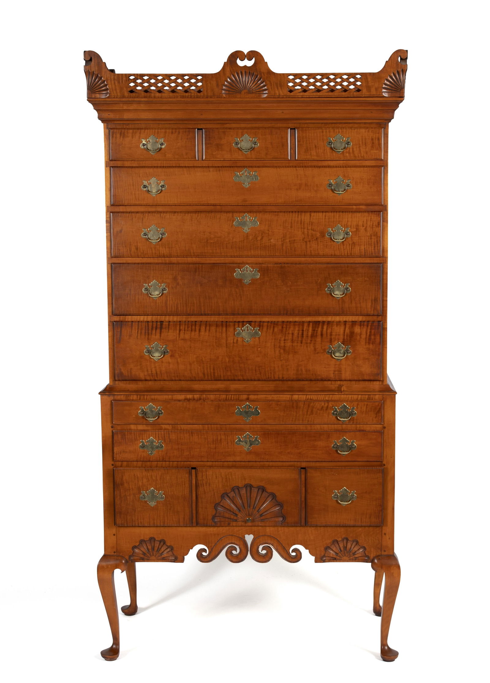 DUNLAP SCHOOL QUEEN ANNE STYLE HIGHBOY BY ELDRED WHEELER: DUNLAP SCHOOL QUEEN ANNE STYLE HIGHBOY BY ELDRED WHEELERAmerican (Massachusetts), 20th century, labeled for "Eldred Wheeler" within a drawer. Two members with a unique cornice carved with pierced latt
