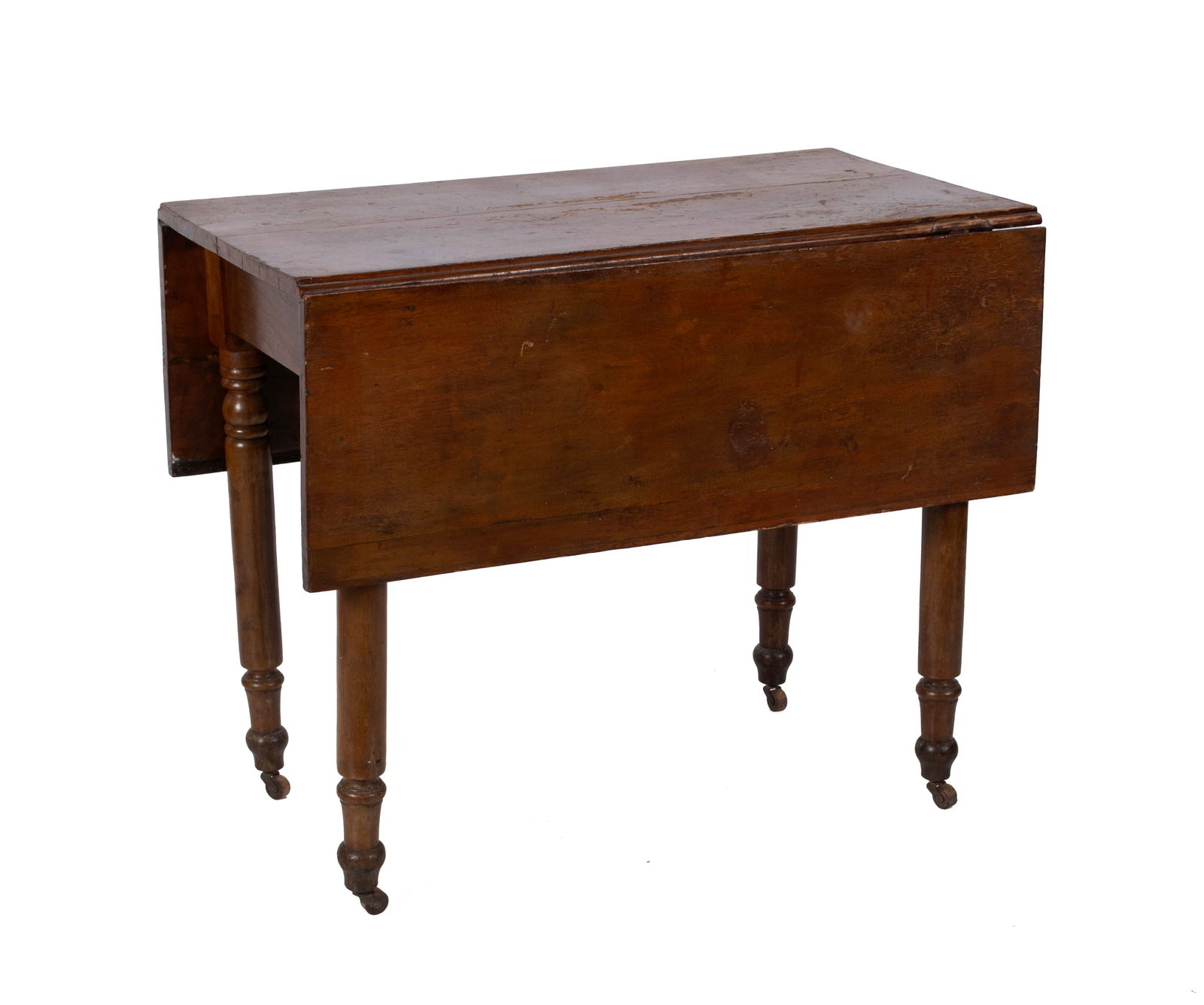 DROP LEAF TABLE: DROP LEAF TABLEAmerican, 19th century. Rectangular drop leaves on turned legs with casters.30 1/4 x 36 3/4 x 20 1/4 in. (76.8 x 93.3 x 51.4 cm.)