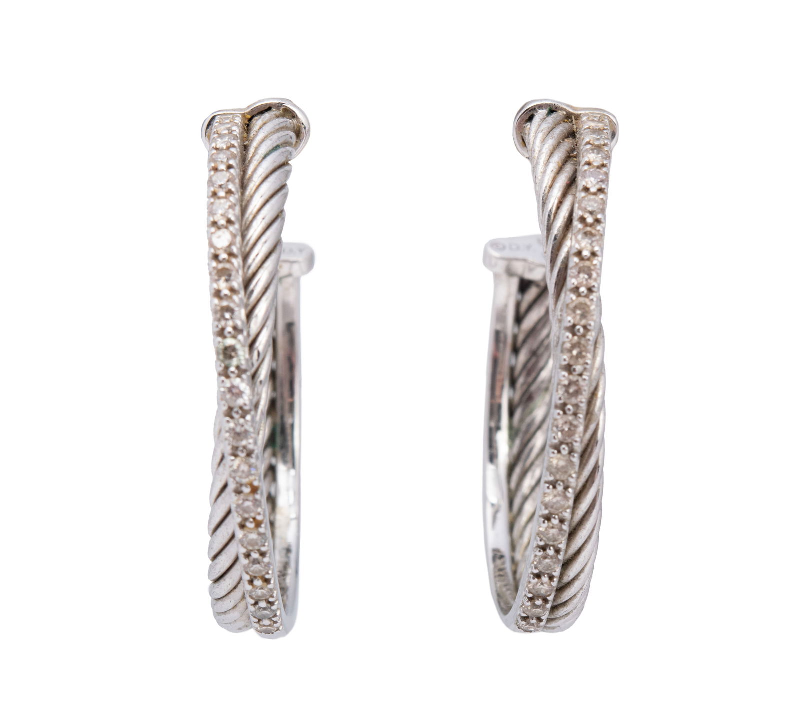DAVID YURMAN DIAMOND CROSSOVER CABLE HOOPS: DAVID YURMAN DIAMOND CROSSOVER CABLE HOOPS A pair of pierced cable sterling silver hoops with a crossover hoop row of 14k white gold set with diamonds, hallmarked. Each (approx.): 1 1/4 in. (3.2