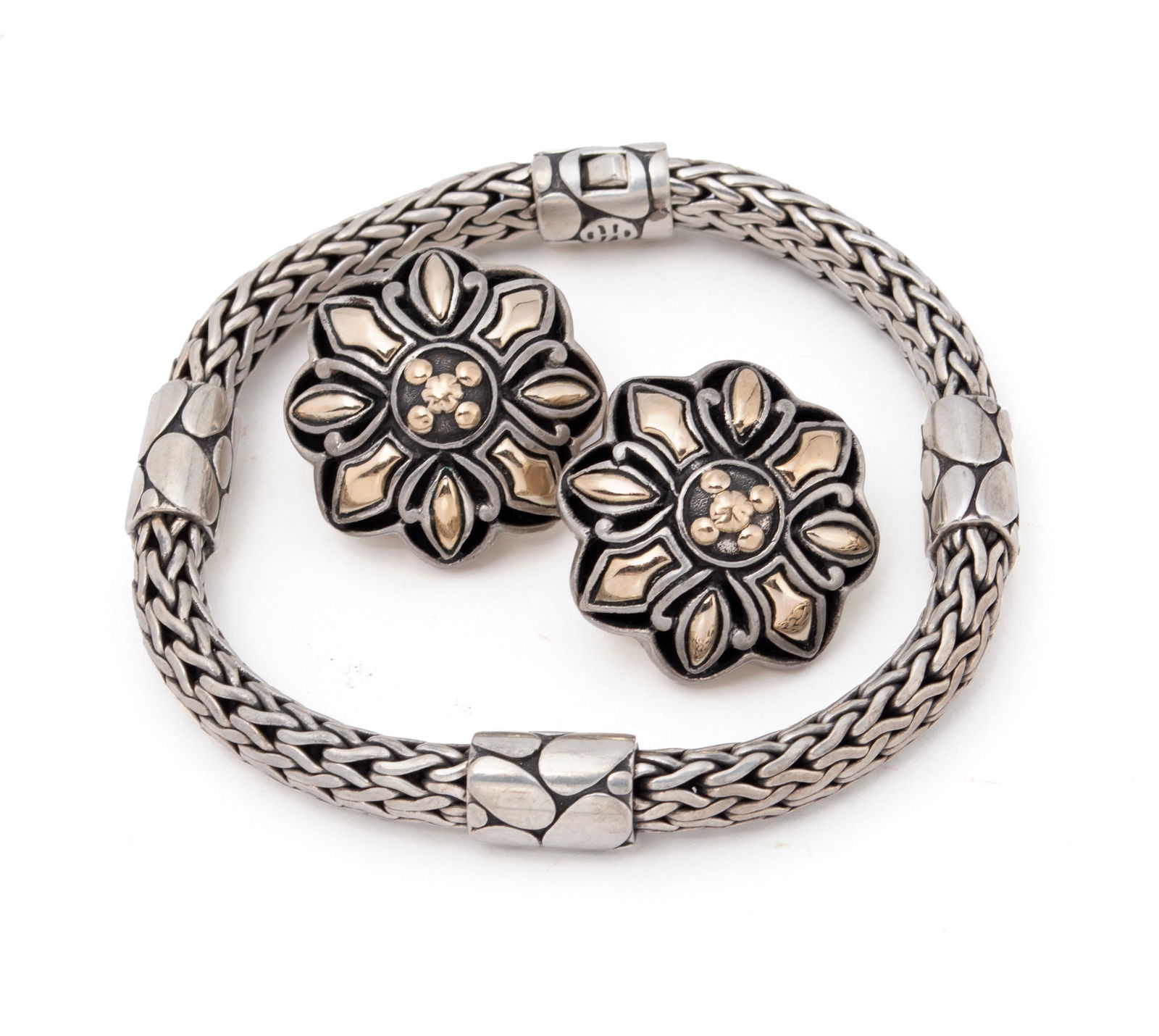 JOHN HARDY BRACELET & EARRINGS: JOHN HARDY BRACELET & EARRINGSA pair of sterling silver clip-on earrings with 18k yellow gold trim and a sterling silver Kali pebble station bracelet. Hallmarked.Bracelet: 8 in. (20.3 cm.); Total weig