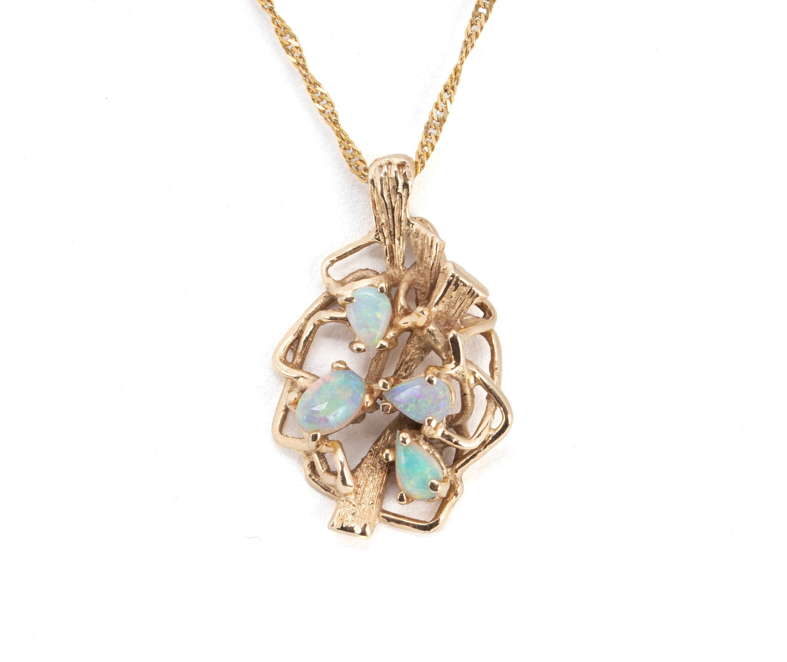 OPAL & GOLD PENDANT NECKLACE: OPAL & GOLD PENDANT NECKLACE A 14k yellow gold open design pendant set with one (1) oval opal (6mm x 4mm) and three (3) pear cut opals each measuring approximately (6mm x 3.5mm). Pendant is suspended