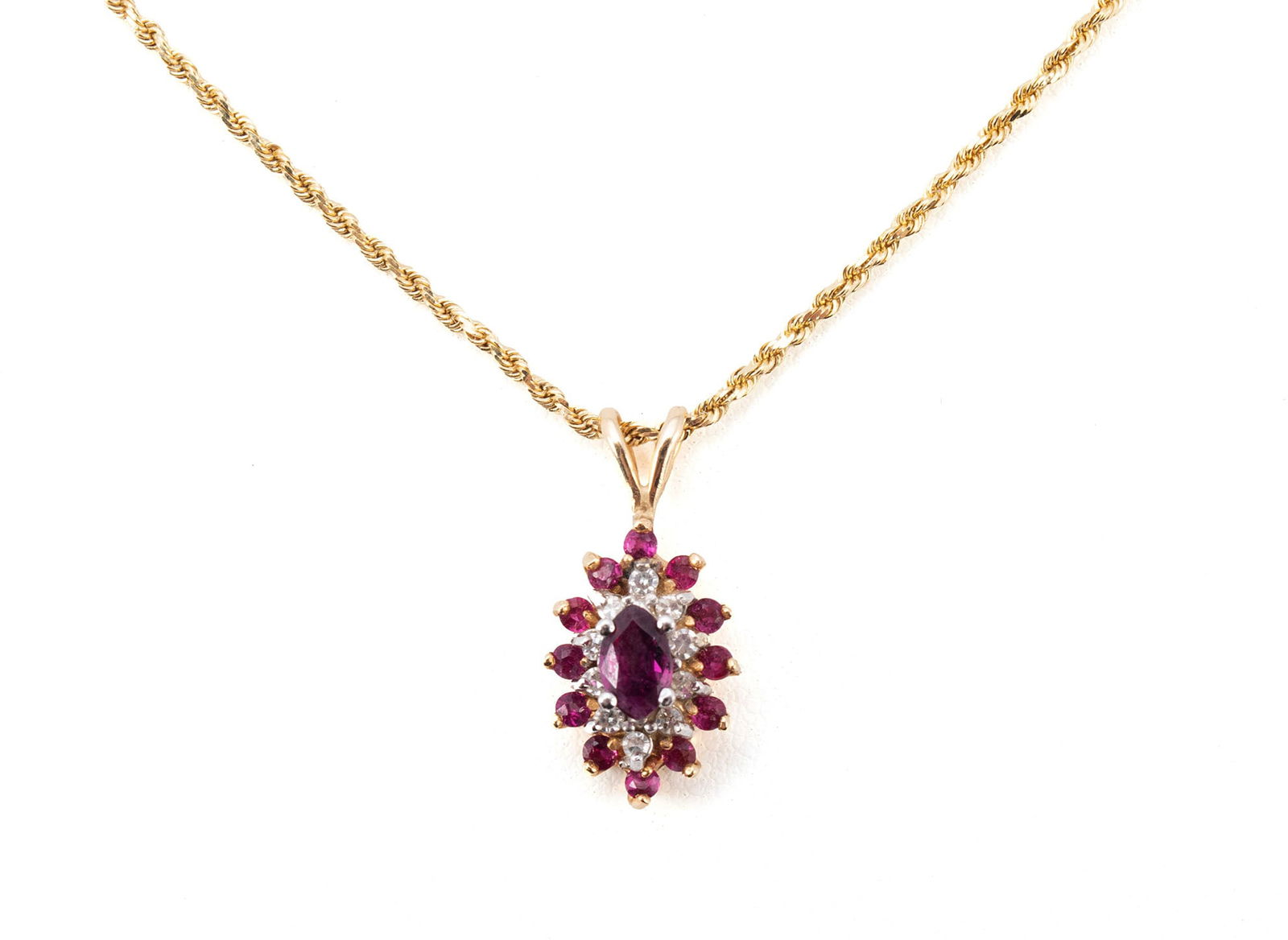 RUBY DIAMOND YELLOW GOLD NECKLACE: RUBY DIAMOND YELLOW GOLD NECKLACE A 14k yellow gold rope chain with pendant having center marquise ruby measuring 6mm x 3.7mm surrounded by ten (10) round single cut diamonds surrounded by twelve